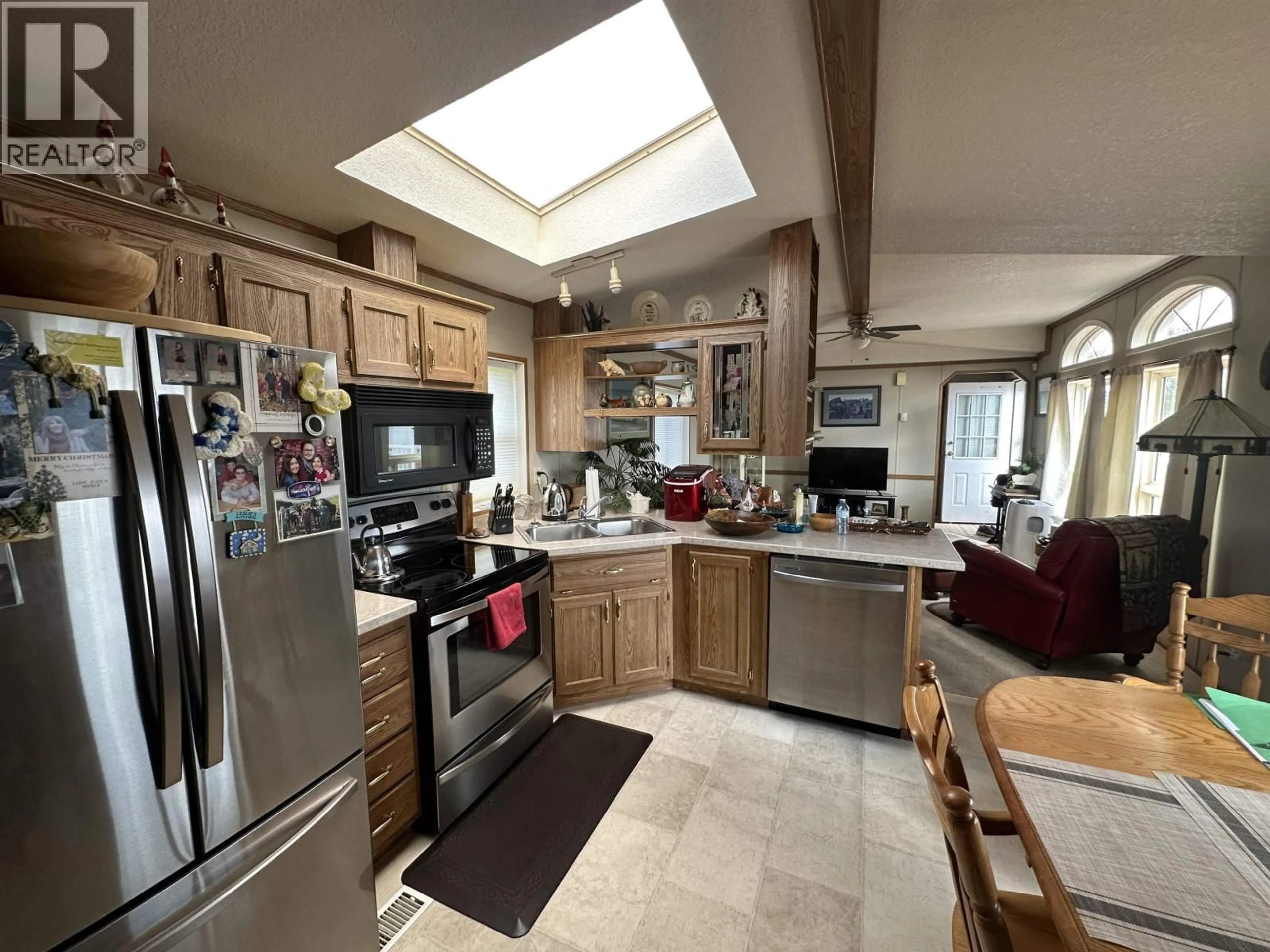 Open concept kitchen, ceramic/tile floor for 8805 PINE ROAD, Fort St. John British Columbia V1J4M7