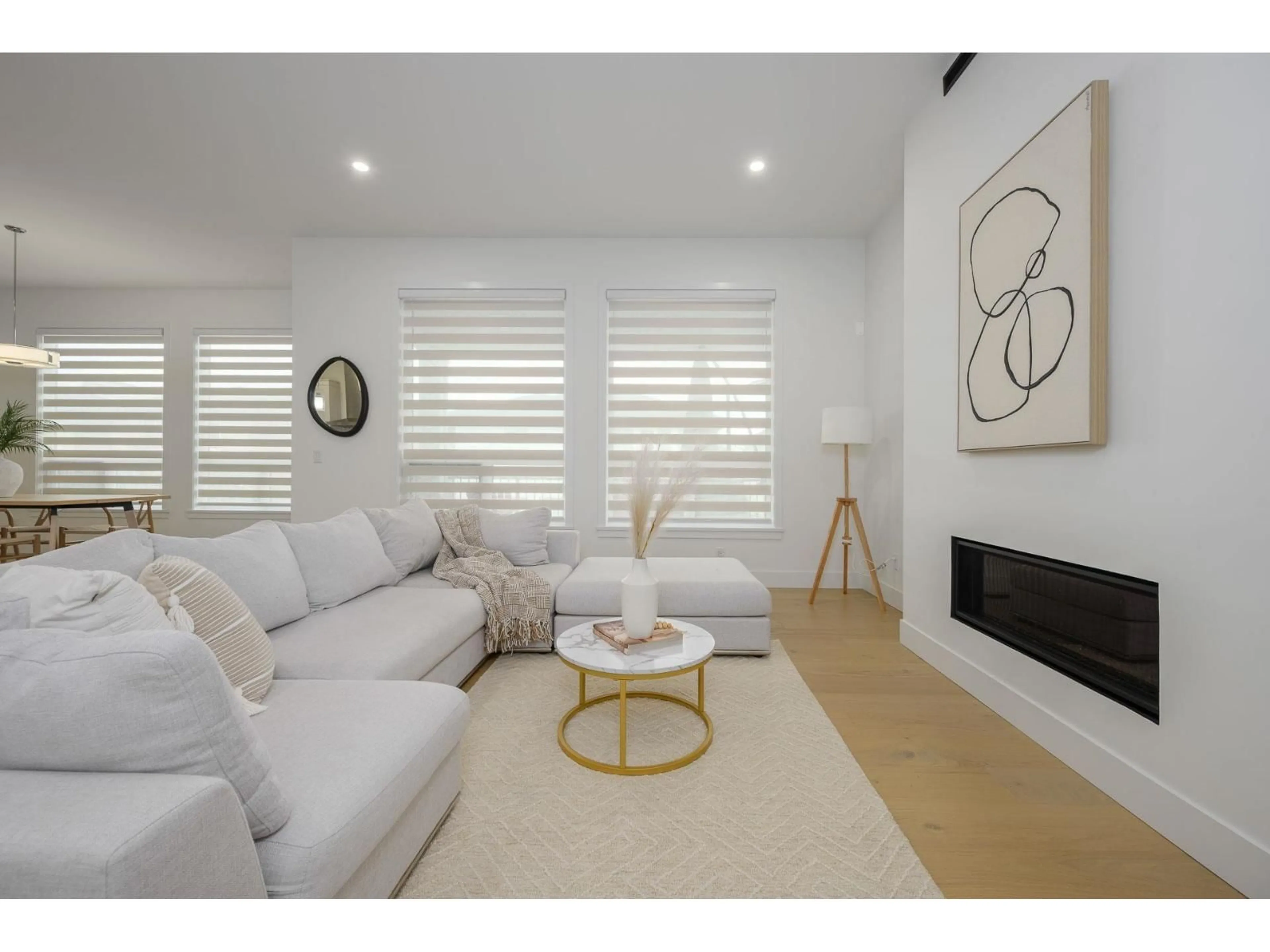 Living room with furniture, wood/laminate floor for 19655 74A AVENUE, Langley British Columbia V2Y3R8