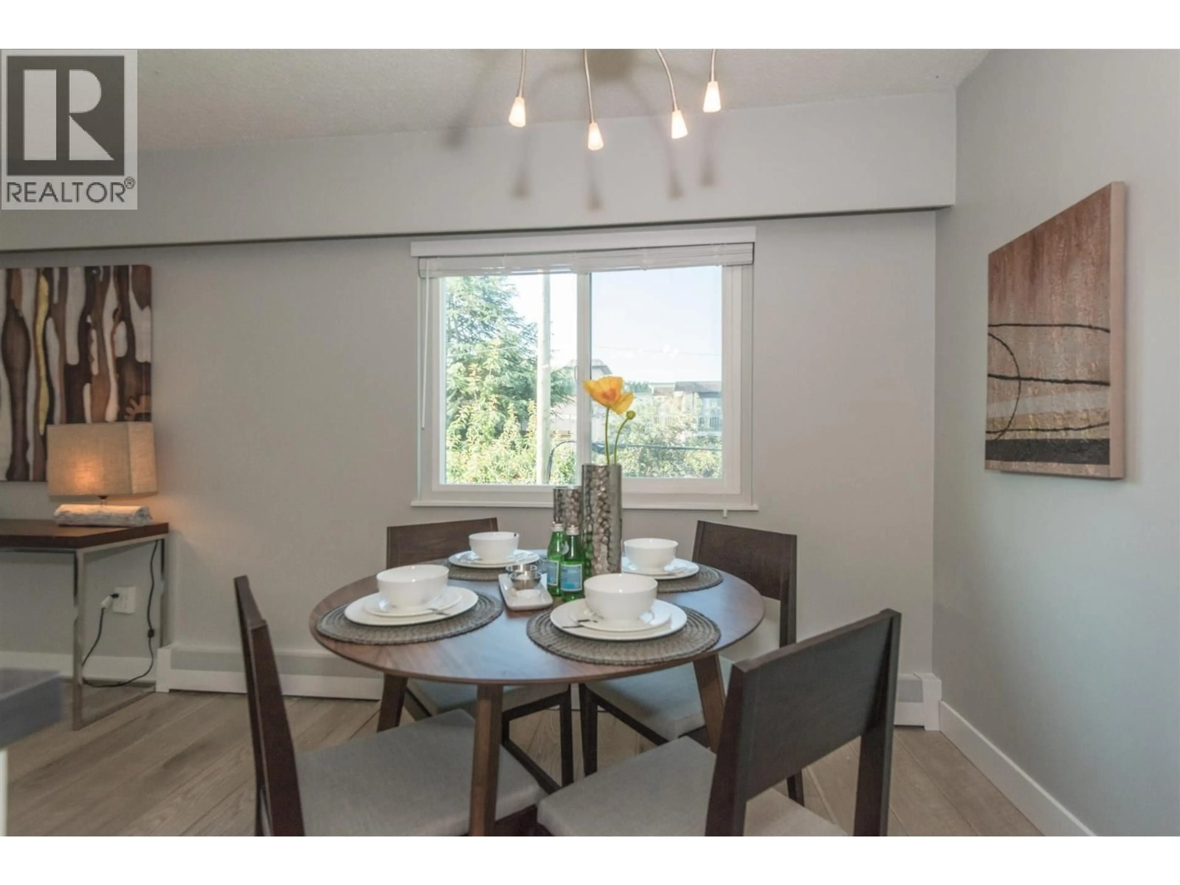 Dining room, wood/laminate floor for 405 - 711 6TH AVENUE, Vancouver British Columbia V5T1L7