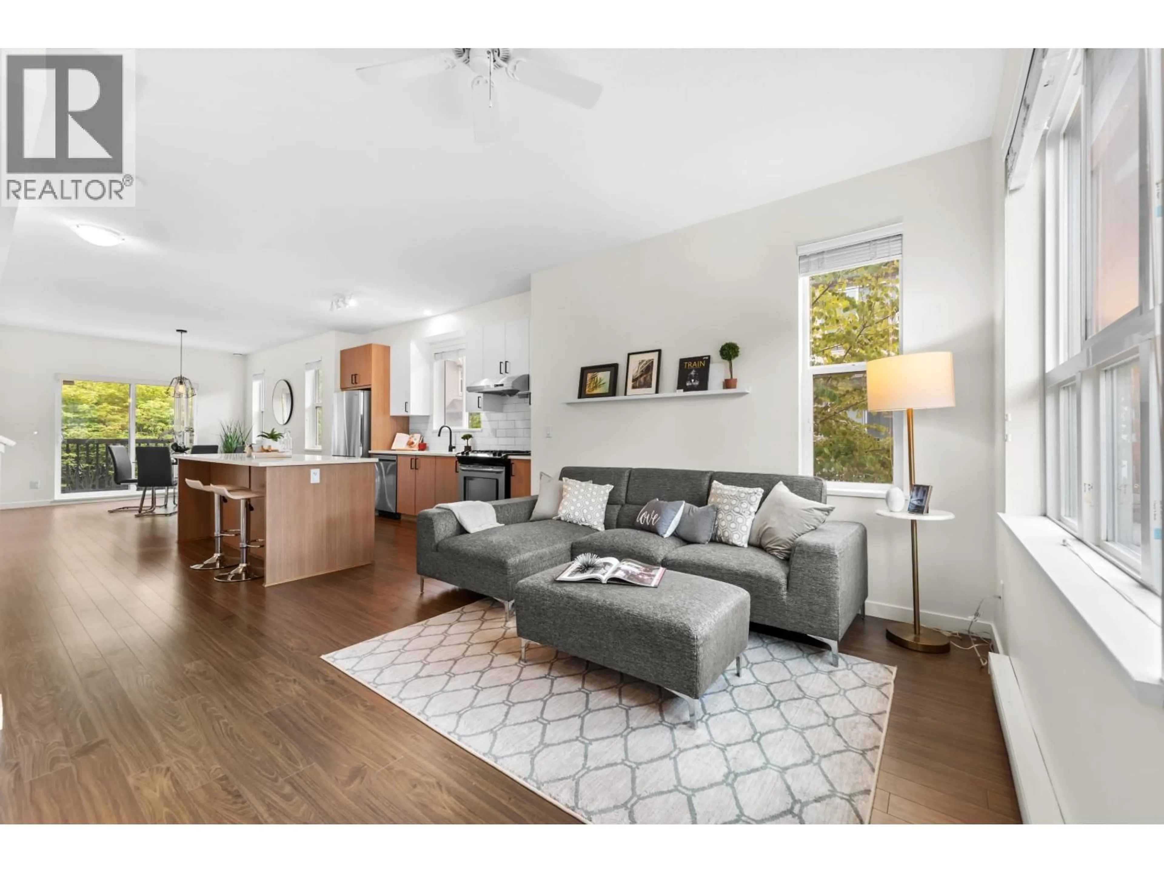 Living room with furniture, wood/laminate floor for 14 - 9533 TOMICKI AVENUE, Richmond British Columbia V6X0E5
