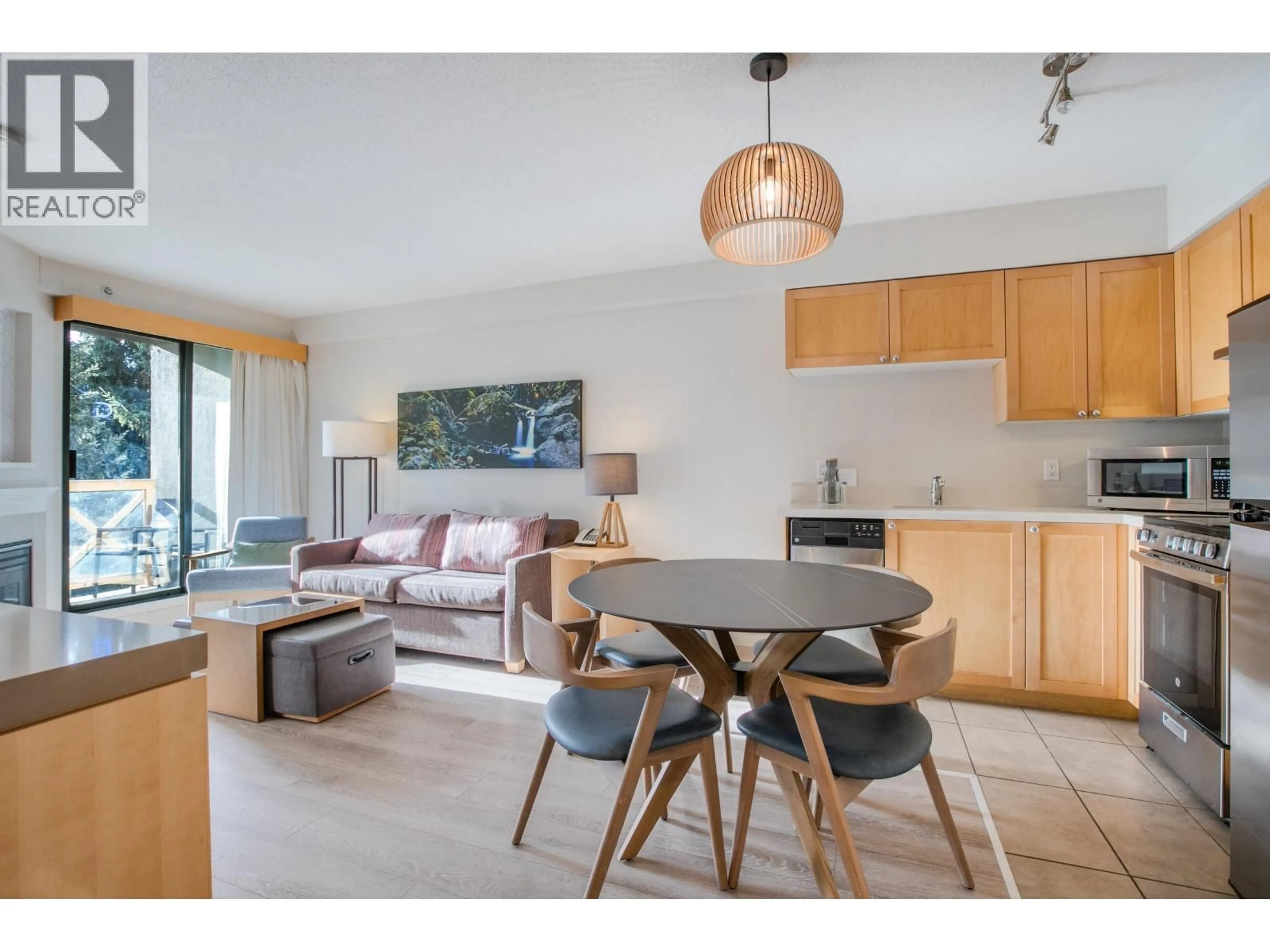 Living room with furniture, wood/laminate floor for 1509 - 4308 MAIN STREET, Whistler British Columbia V8E1A9