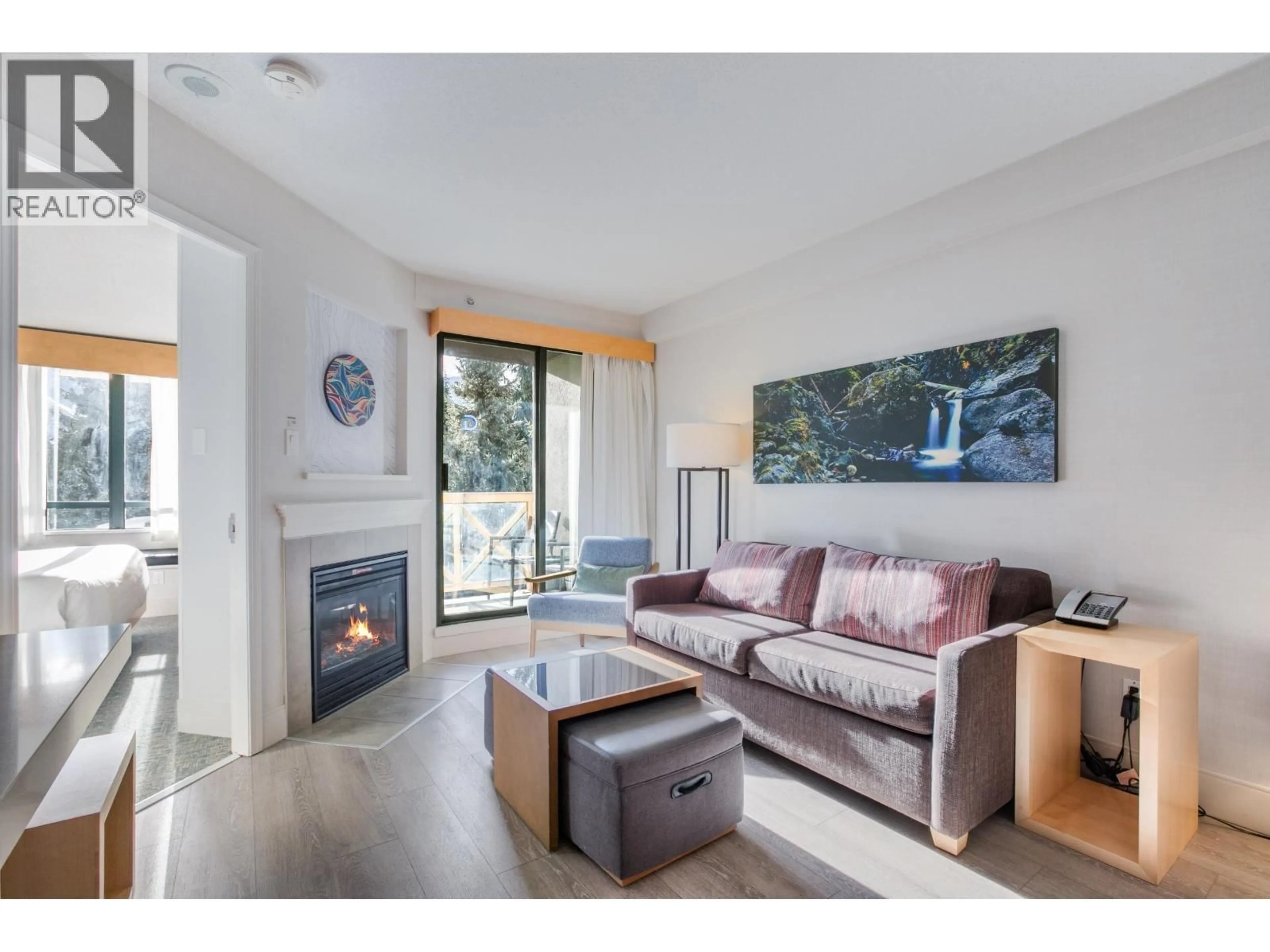 Living room with furniture, wood/laminate floor for 1509 - 4308 MAIN STREET, Whistler British Columbia V8E1A9