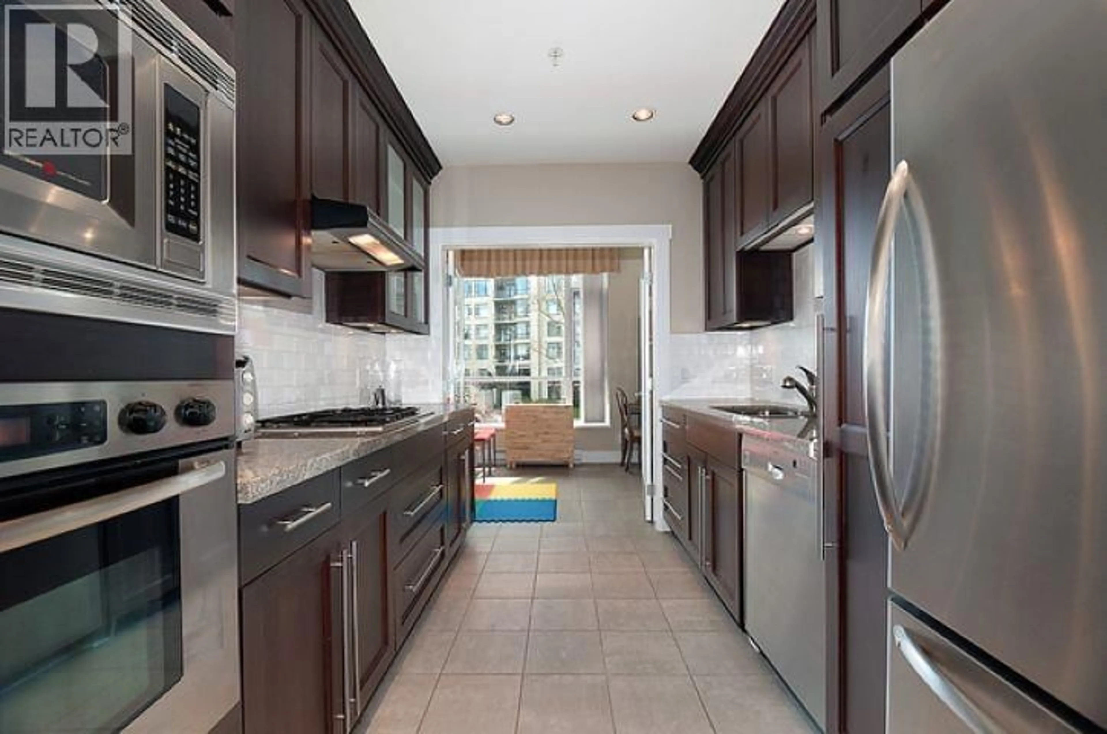 Contemporary kitchen, ceramic/tile floor for 320 - 4685 VALLEY DRIVE, Vancouver British Columbia V6J5M2