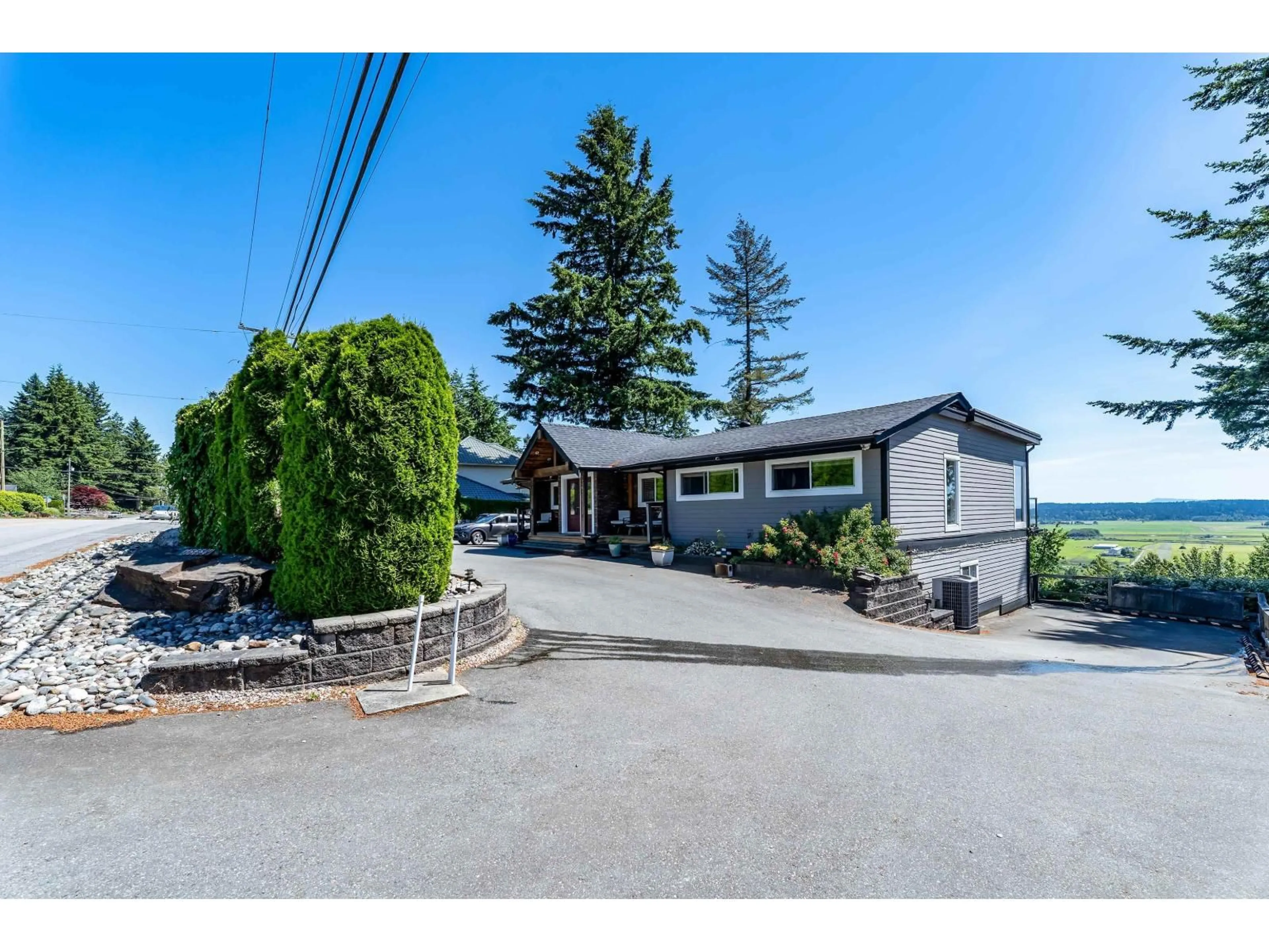 A pic from outside/outdoor area/front of a property/back of a property/a pic from drone, water/lake/river/ocean view for 13634 56 AVENUE, Surrey British Columbia V3X2Z8