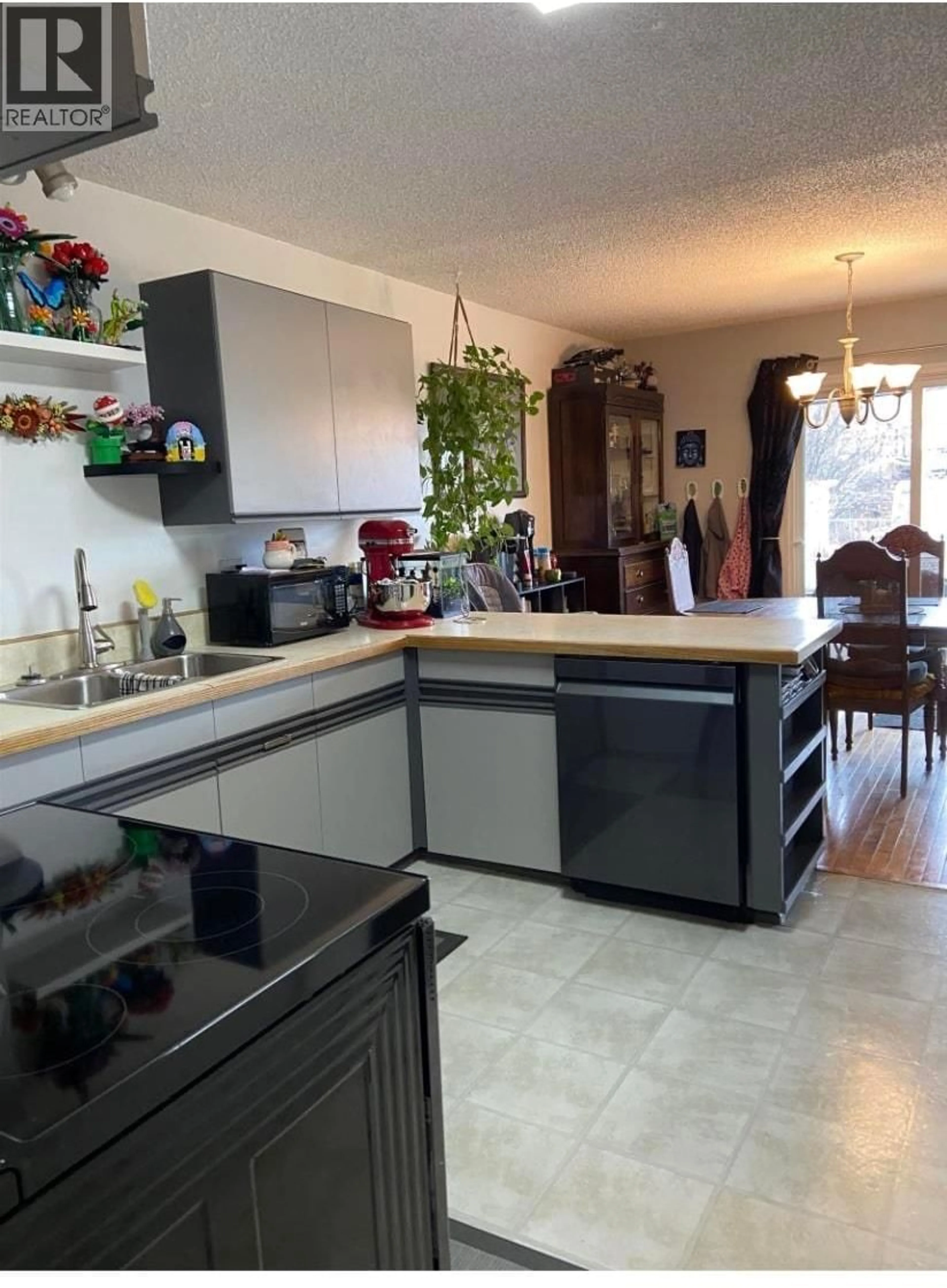 Open concept kitchen, unknown for 10856 102 STREET, Fort St. John British Columbia V1J4X7