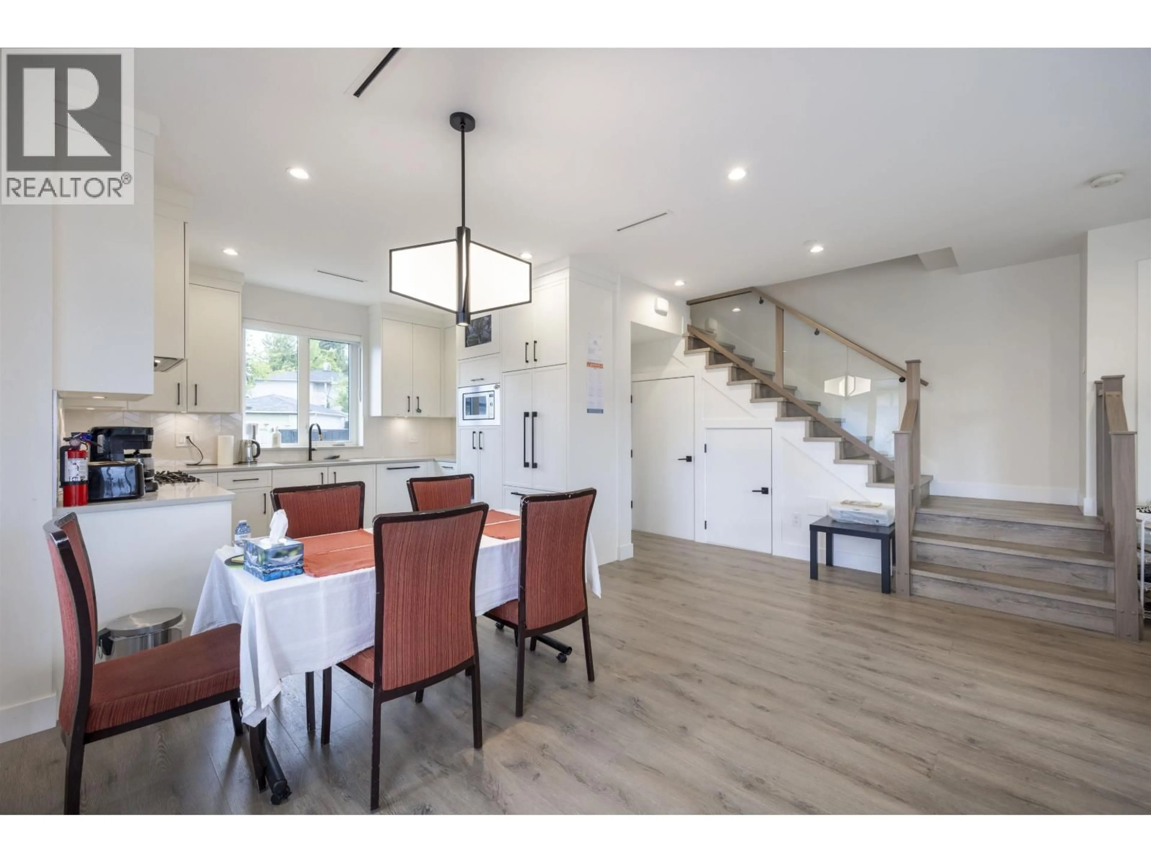 Open concept kitchen, wood/laminate floor for 4541 HOY STREET, Vancouver British Columbia V5R4N5