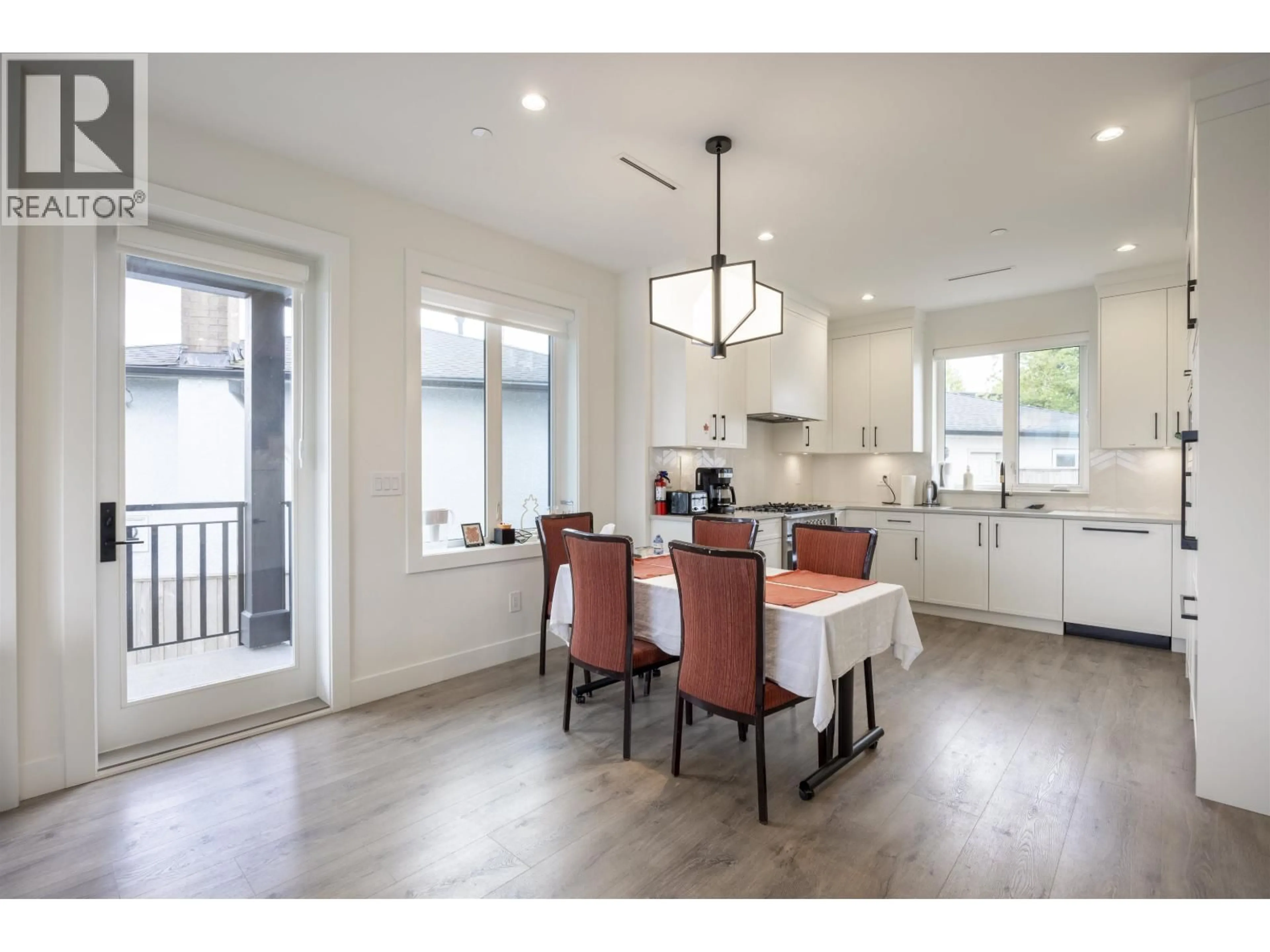 Open concept kitchen, wood/laminate floor for 4541 HOY STREET, Vancouver British Columbia V5R4N5