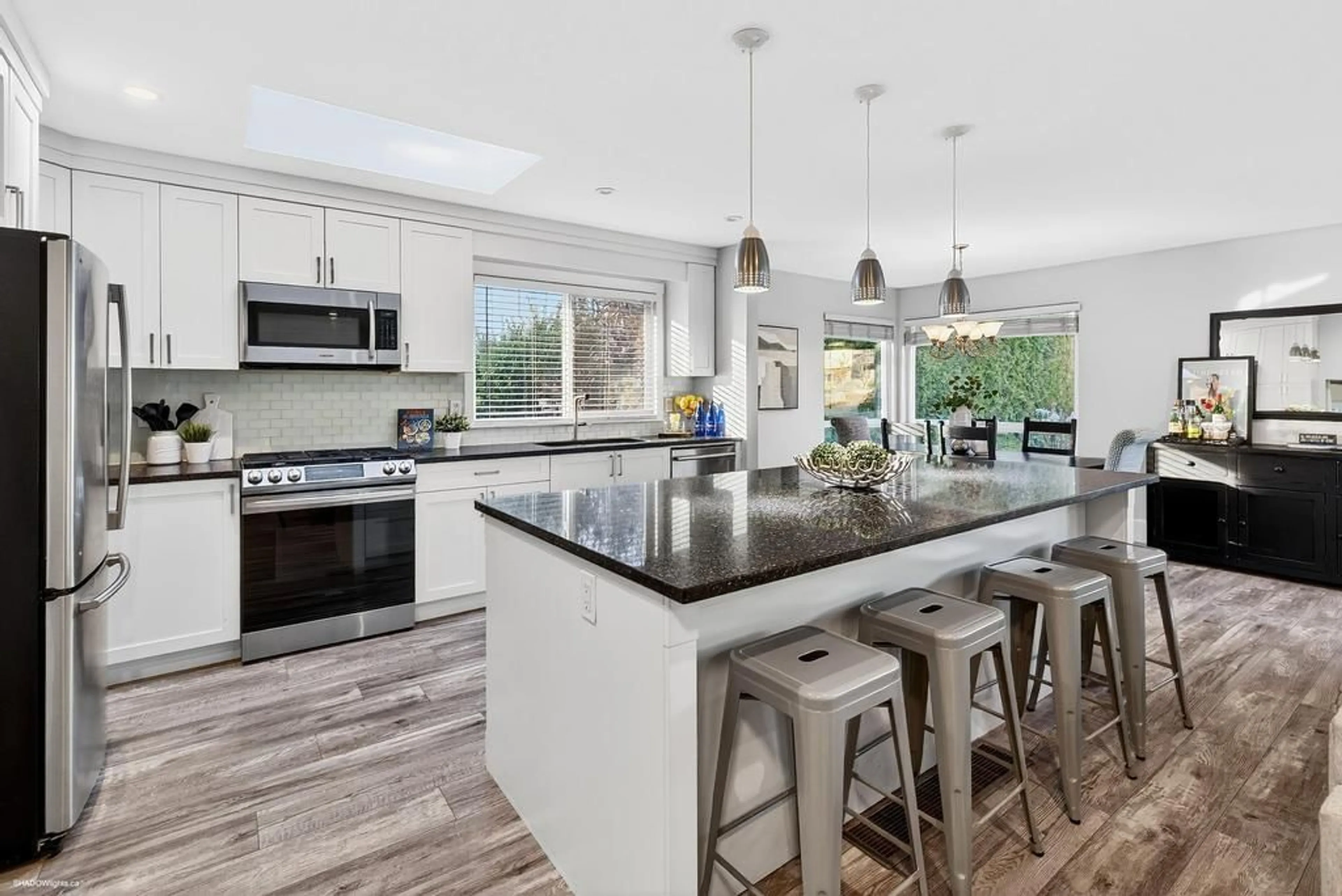 Open concept kitchen, ceramic/tile floor for 11702 64A AVENUE, Delta British Columbia V4E2C6
