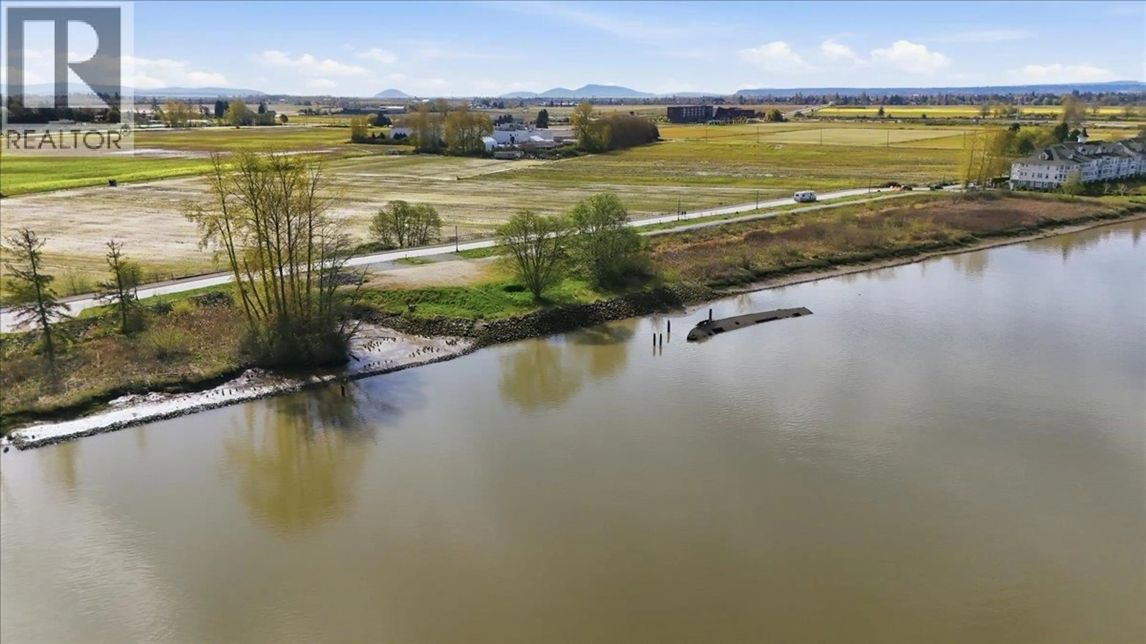 A pic from outside/outdoor area/front of a property/back of a property/a pic from drone, water/lake/river/ocean view for 6345 RIVER ROAD, Delta British Columbia V4K5E3