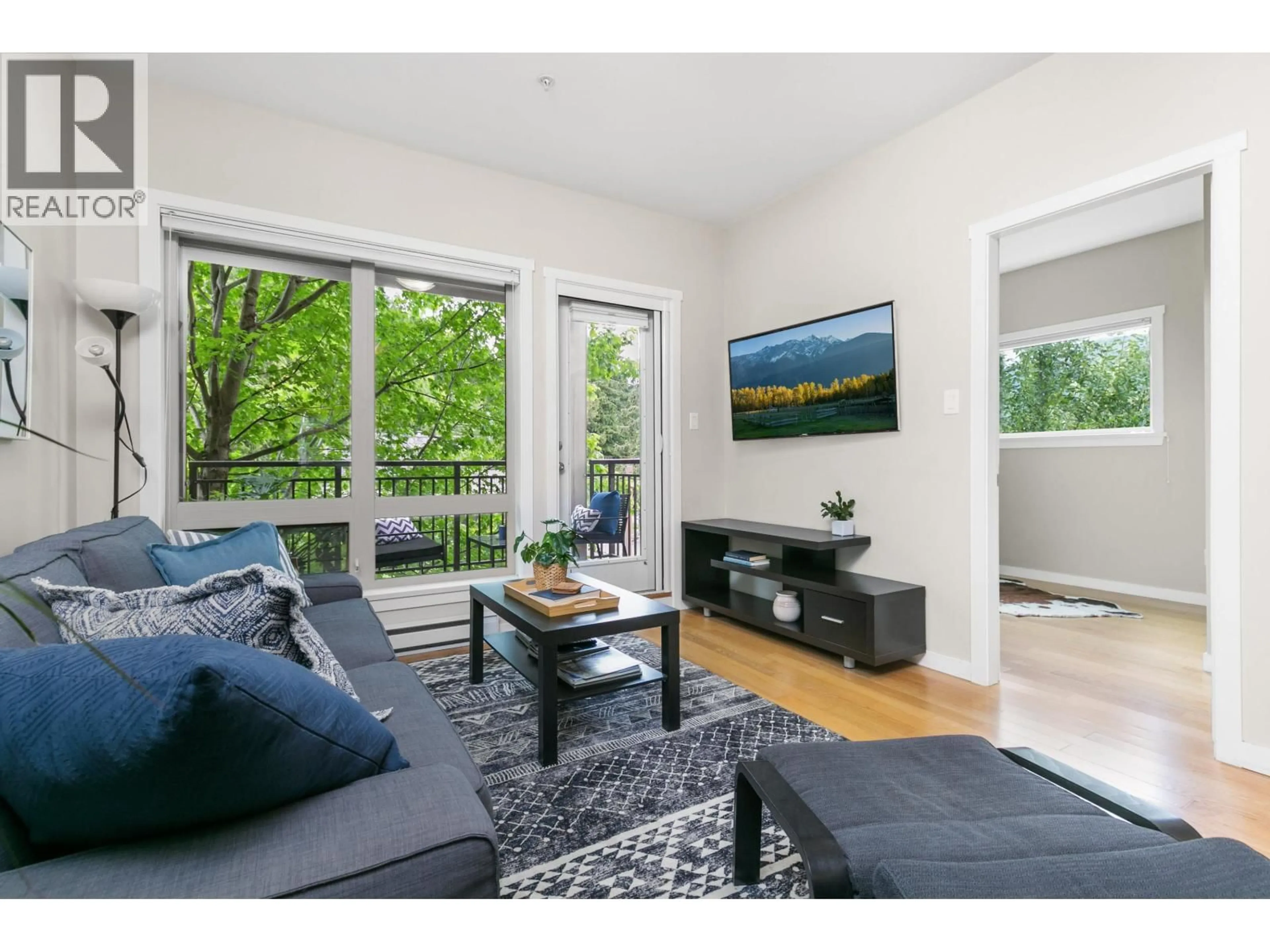 Living room with furniture, wood/laminate floor for 4 - 7450 PROSPECT STREET, Pemberton British Columbia V0N2L1