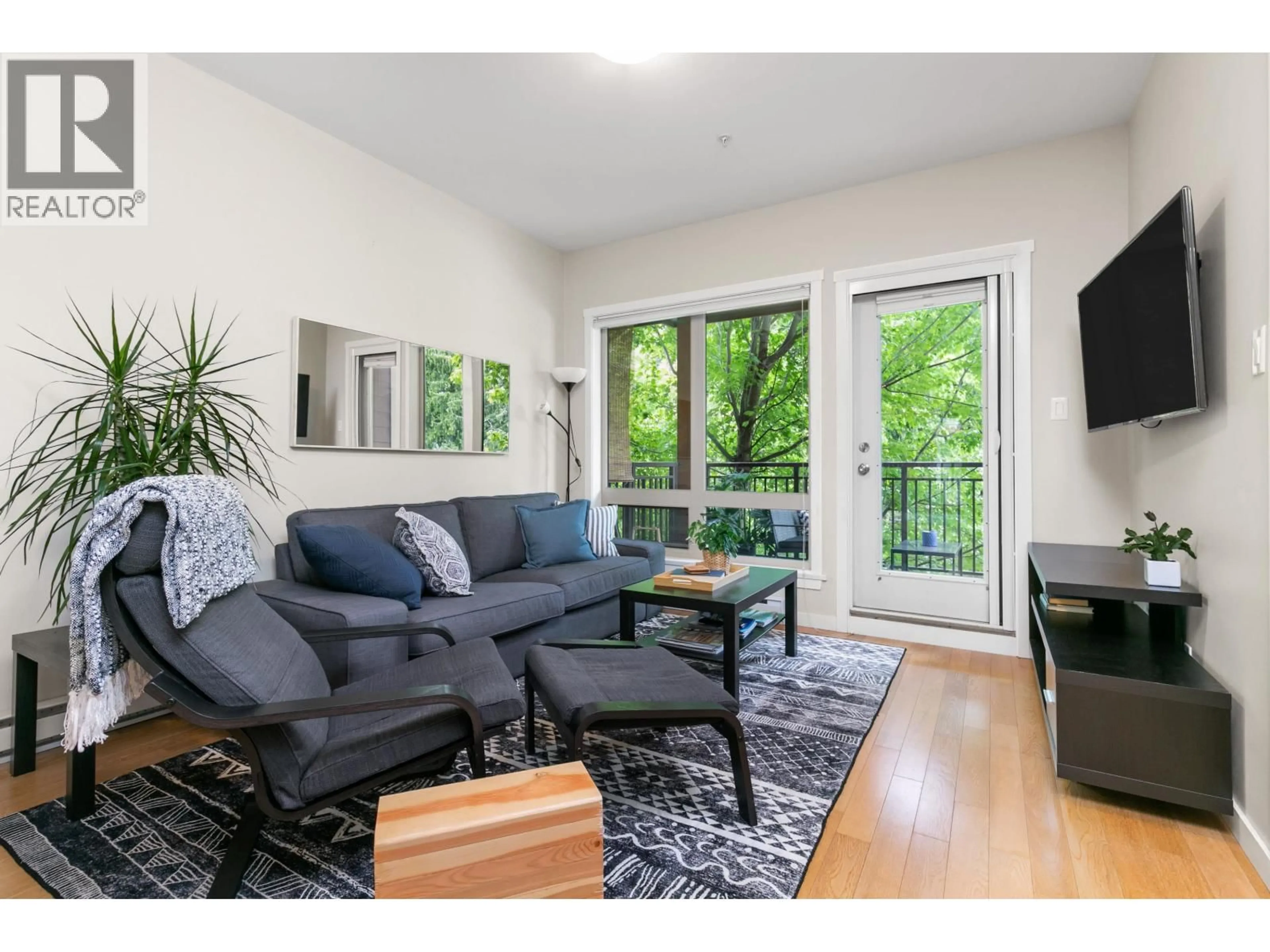Living room with furniture, wood/laminate floor for 4 - 7450 PROSPECT STREET, Pemberton British Columbia V0N2L1