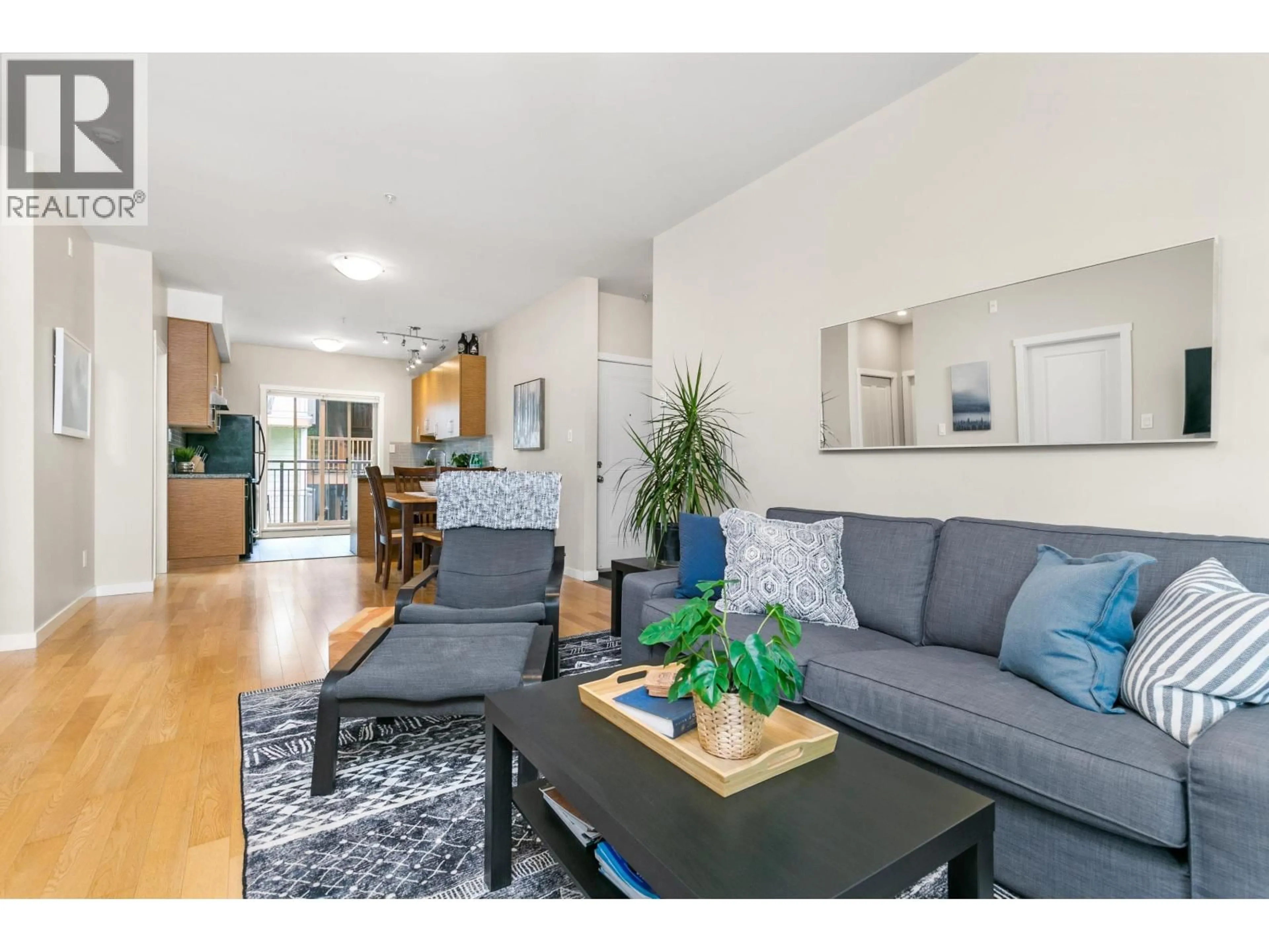 Living room with furniture, wood/laminate floor for 4 - 7450 PROSPECT STREET, Pemberton British Columbia V0N2L1