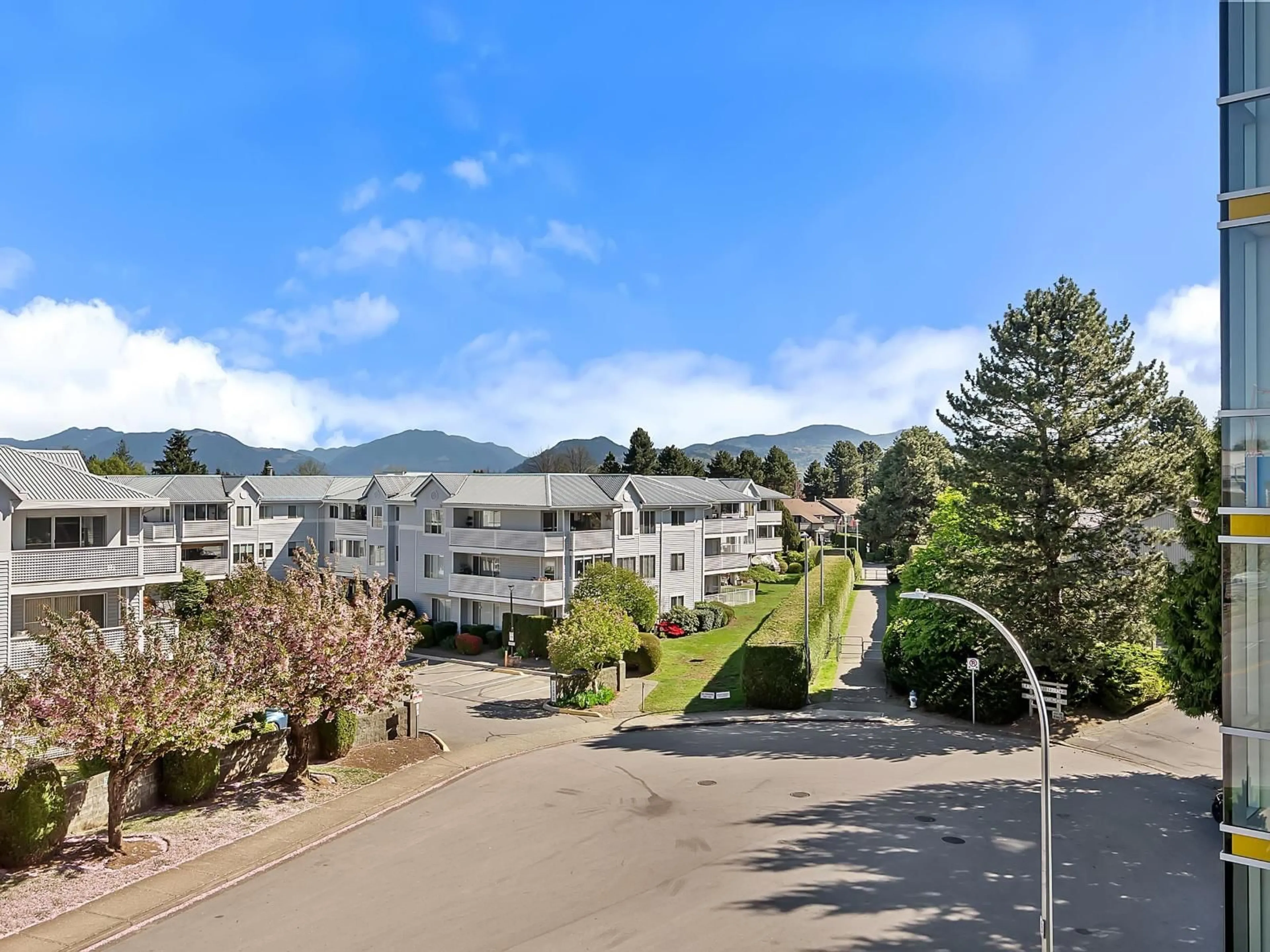 A pic from outside/outdoor area/front of a property/back of a property/a pic from drone, mountain view for 314 - 32838 LANDEAU PLACE, Abbotsford British Columbia V2S0M6