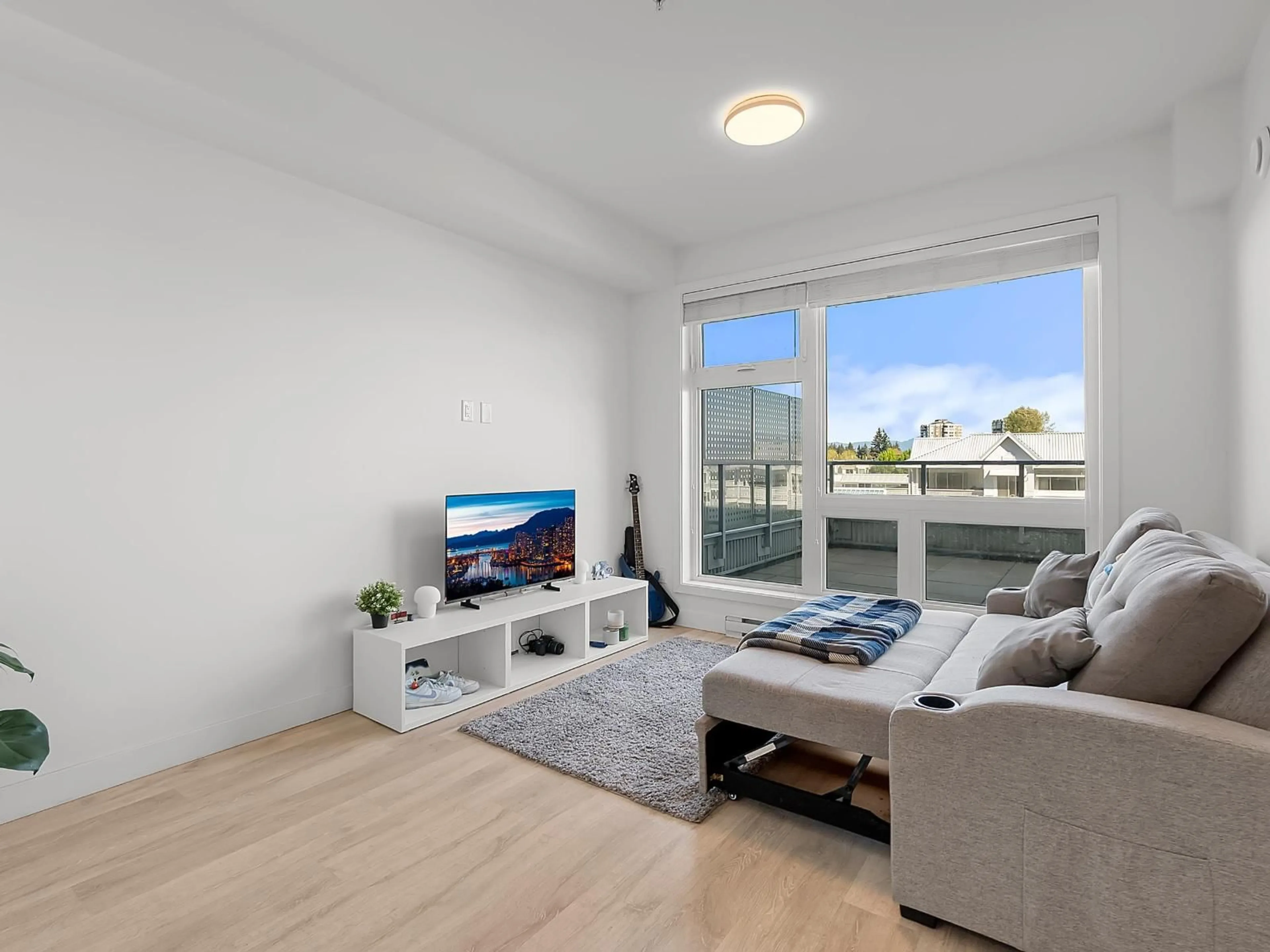 Living room with furniture, wood/laminate floor for 314 - 32838 LANDEAU PLACE, Abbotsford British Columbia V2S0M6
