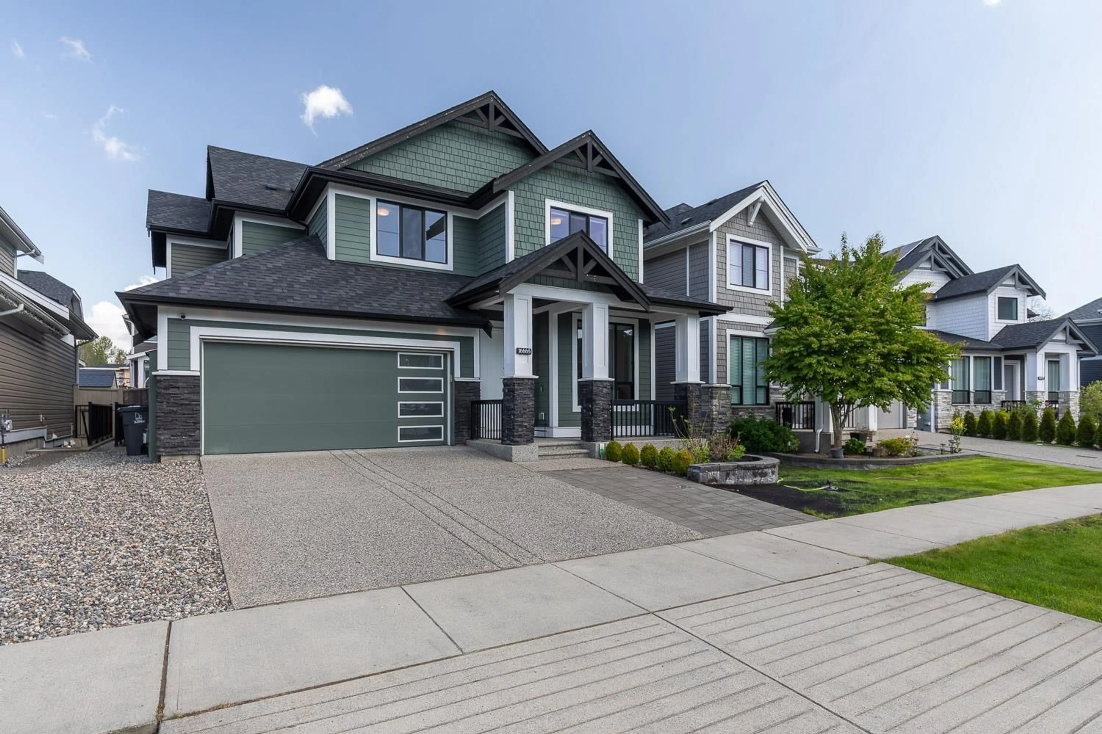Home with vinyl exterior material, street for 16665 103A AVENUE, Surrey British Columbia V4N6V4