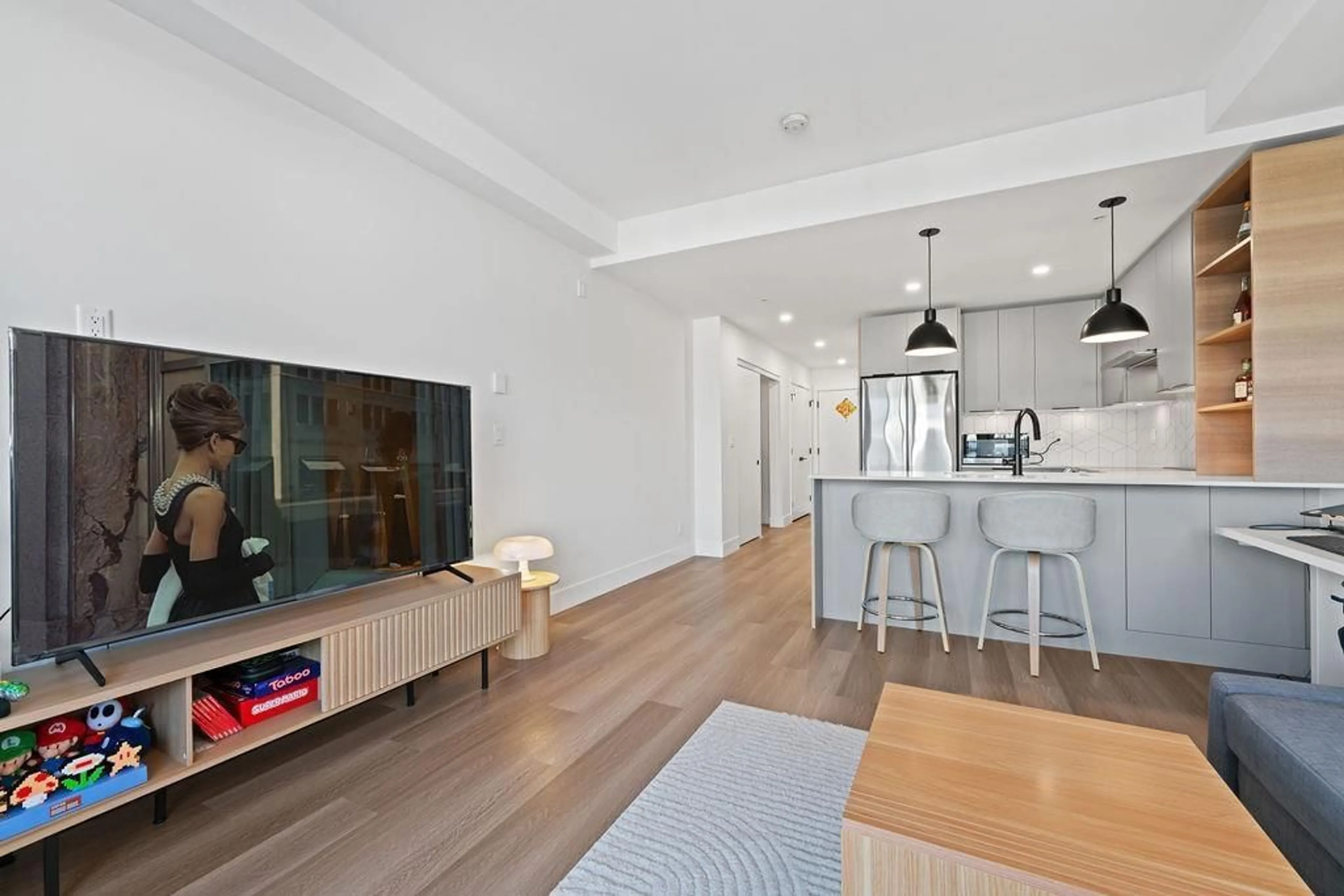 Open concept kitchen, wood/laminate floor for 615 - 10778 138 STREET, Surrey British Columbia V3T0S5