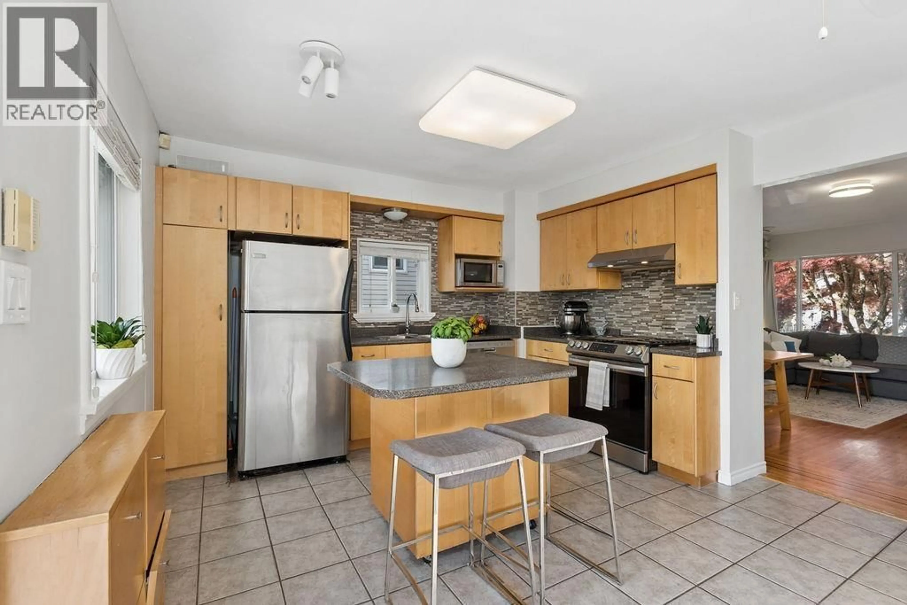 Standard kitchen, ceramic/tile floor for 4344 SKEENA STREET, Vancouver British Columbia V5R2L7