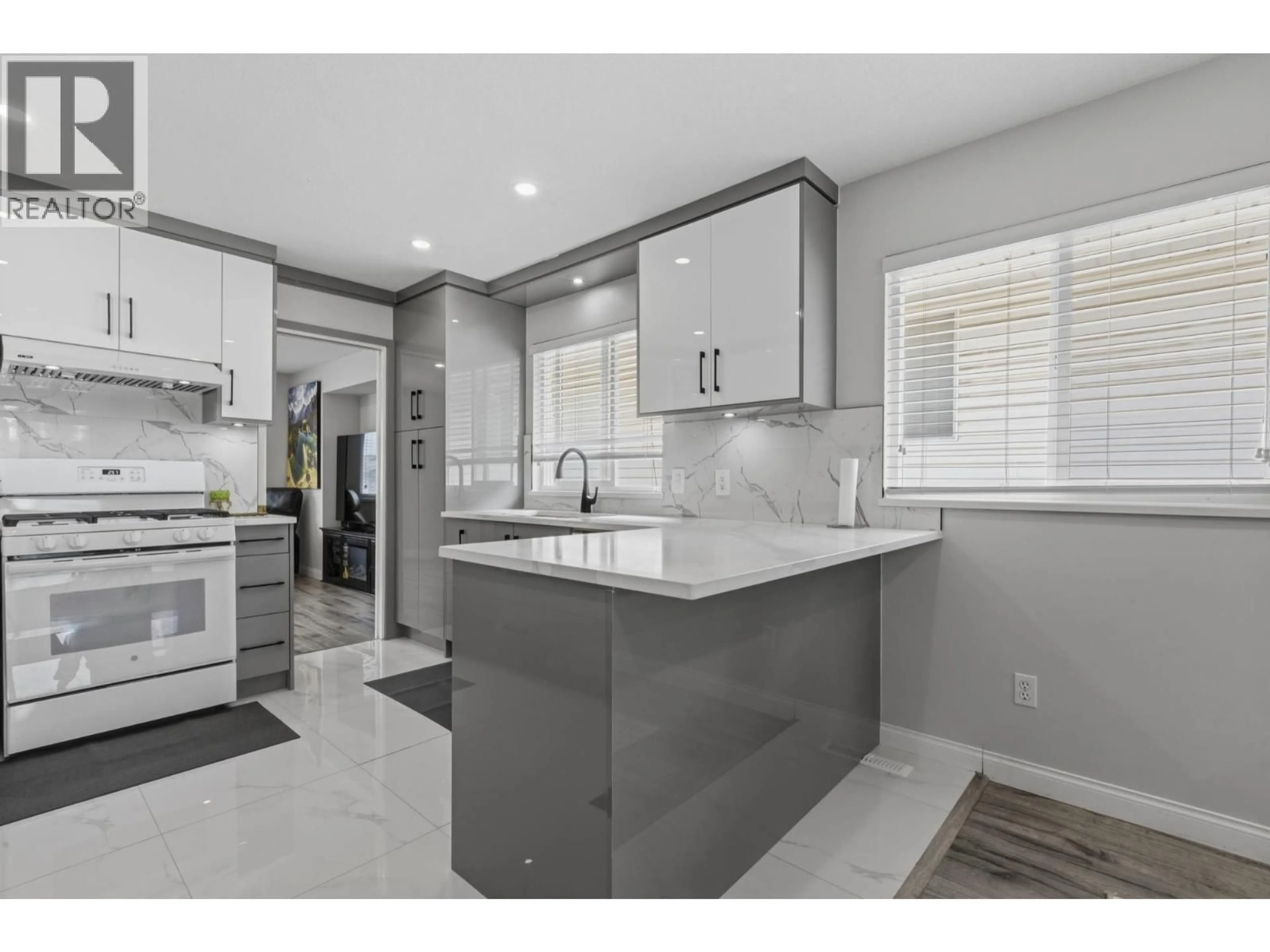 Open concept kitchen, ceramic/tile floor for 1819 JACANA AVENUE, Port Coquitlam British Columbia V3C5C4
