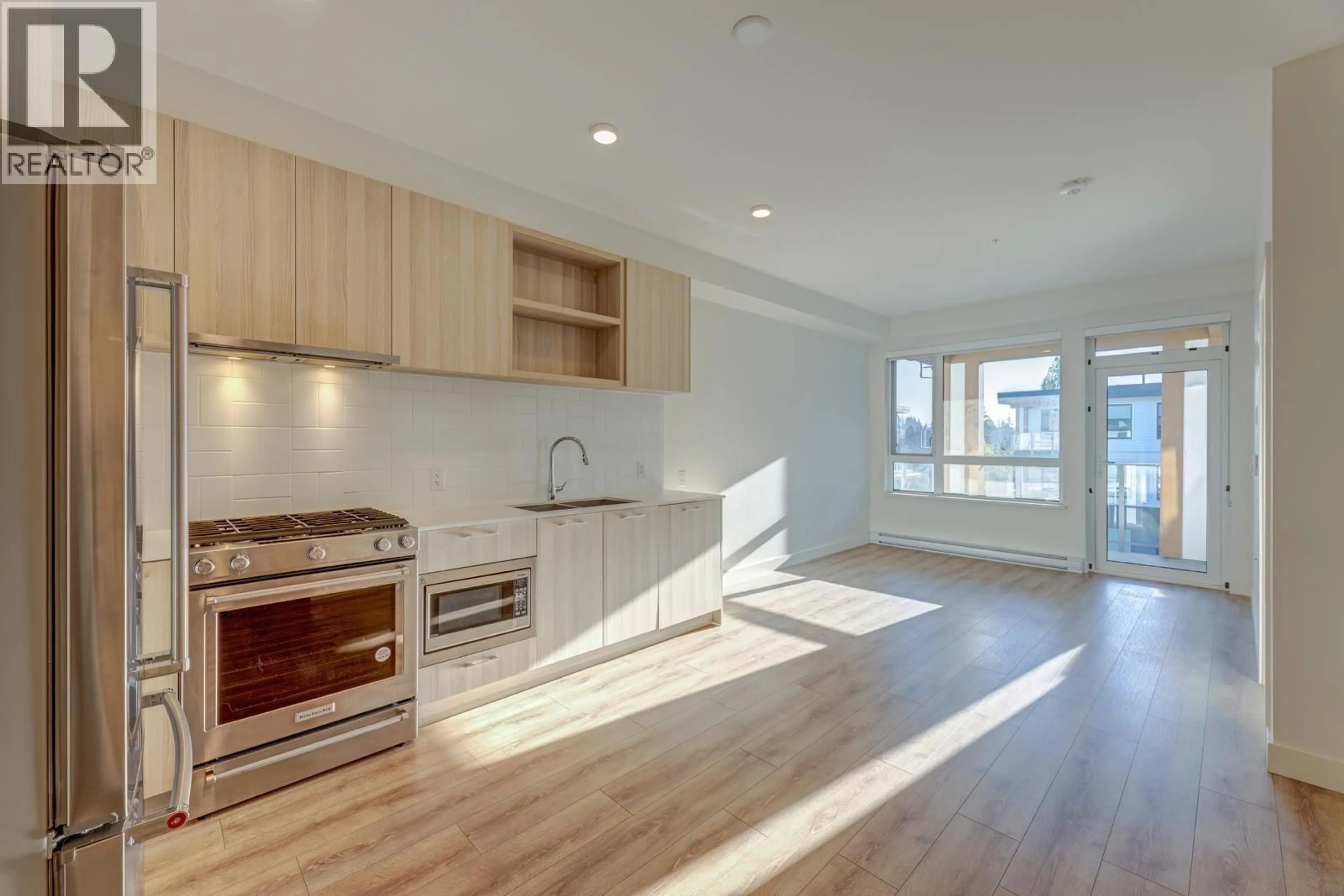 Open concept kitchen, wood/laminate floor for 616 - 735 ANSKAR CRESCENT, Coquitlam British Columbia V3J0L7