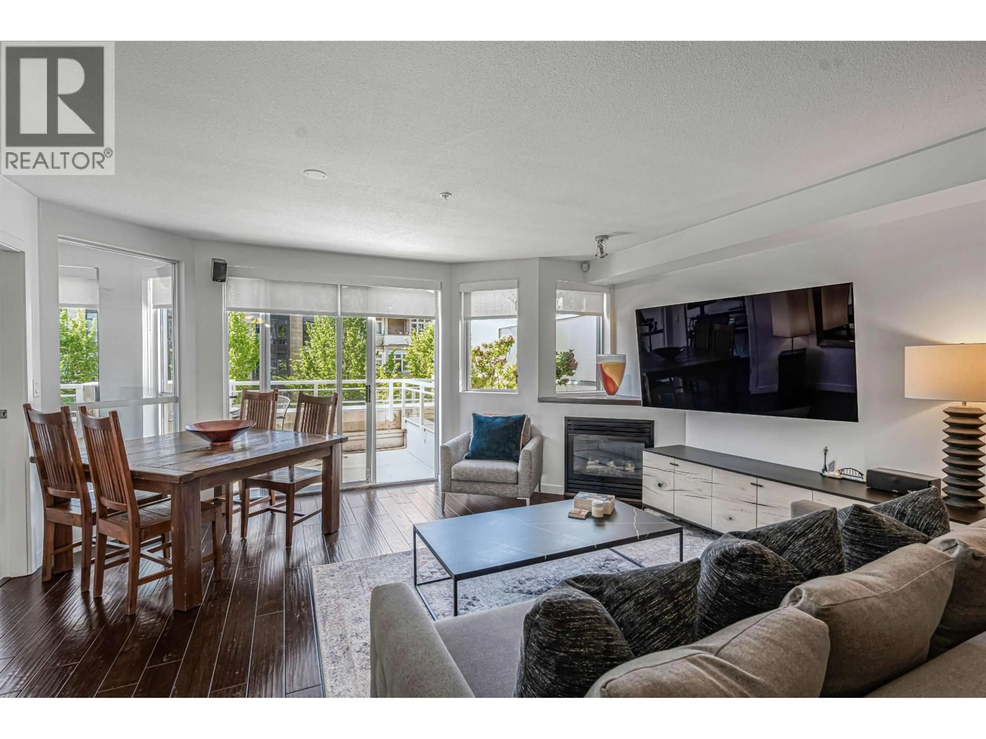 Living room with furniture, unknown for 207 - 122 3RD STREET, North Vancouver British Columbia V7L1E6