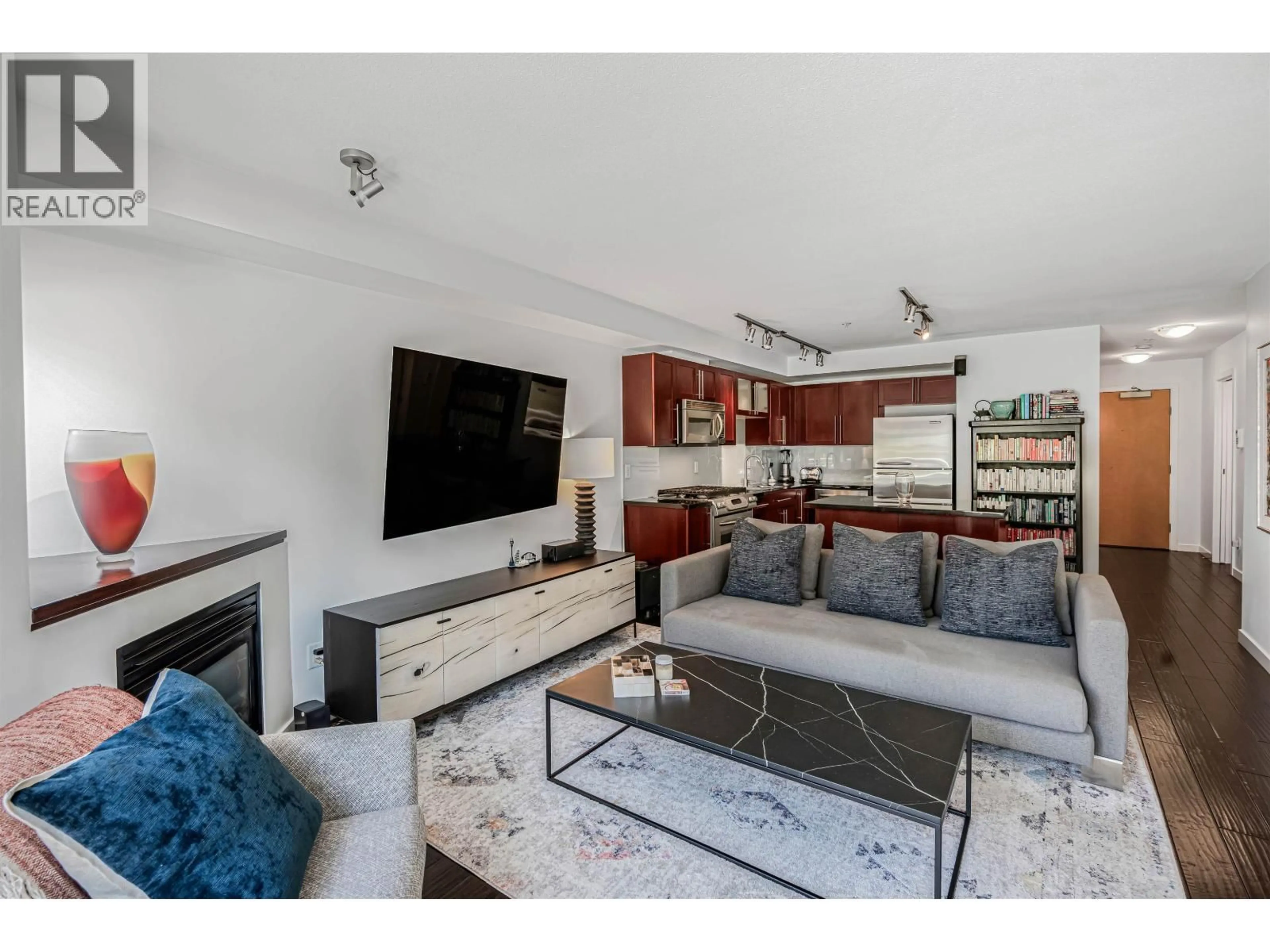 Living room with furniture, unknown for 207 - 122 3RD STREET, North Vancouver British Columbia V7L1E6