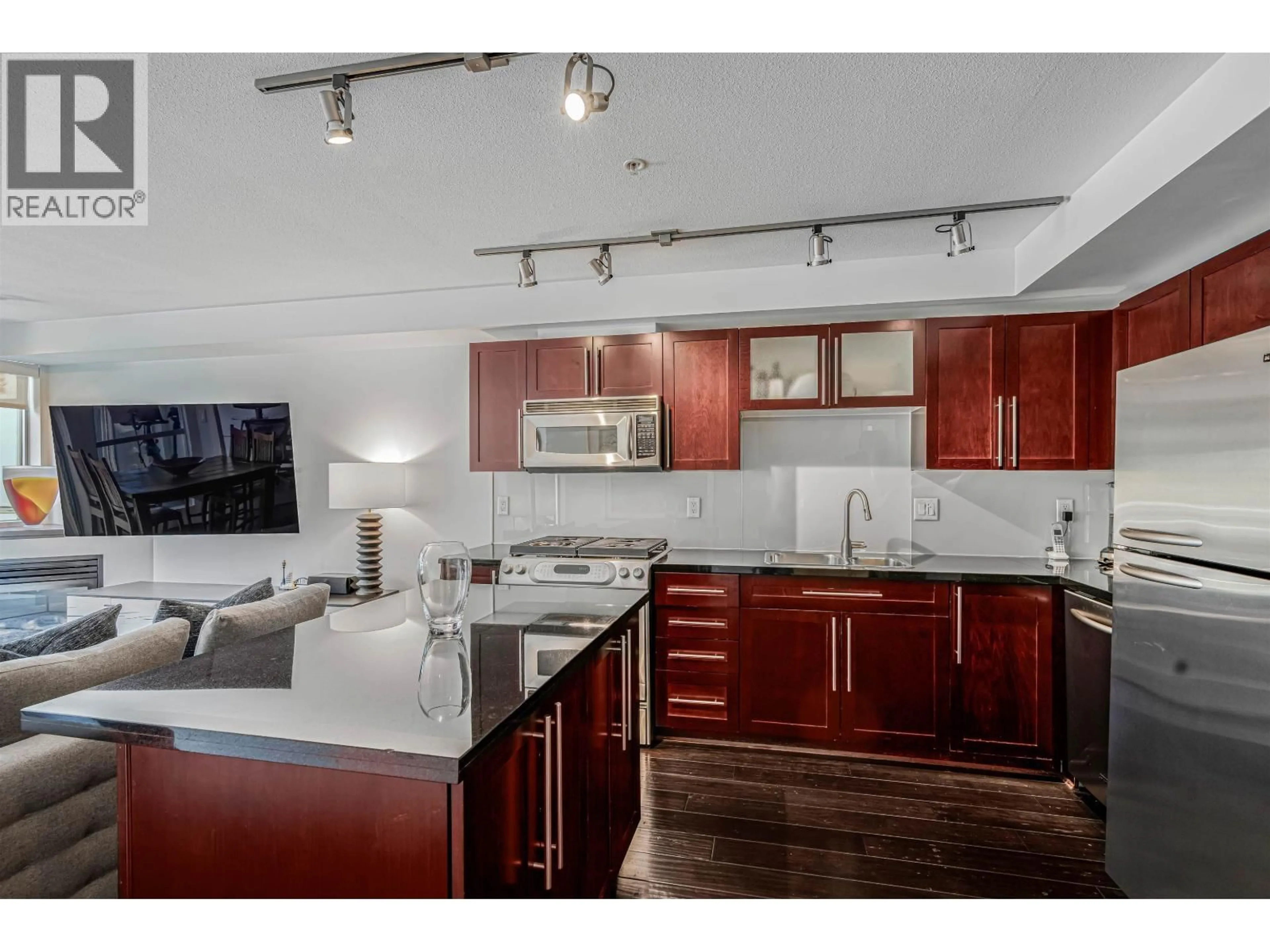 Open concept kitchen, unknown for 207 - 122 3RD STREET, North Vancouver British Columbia V7L1E6