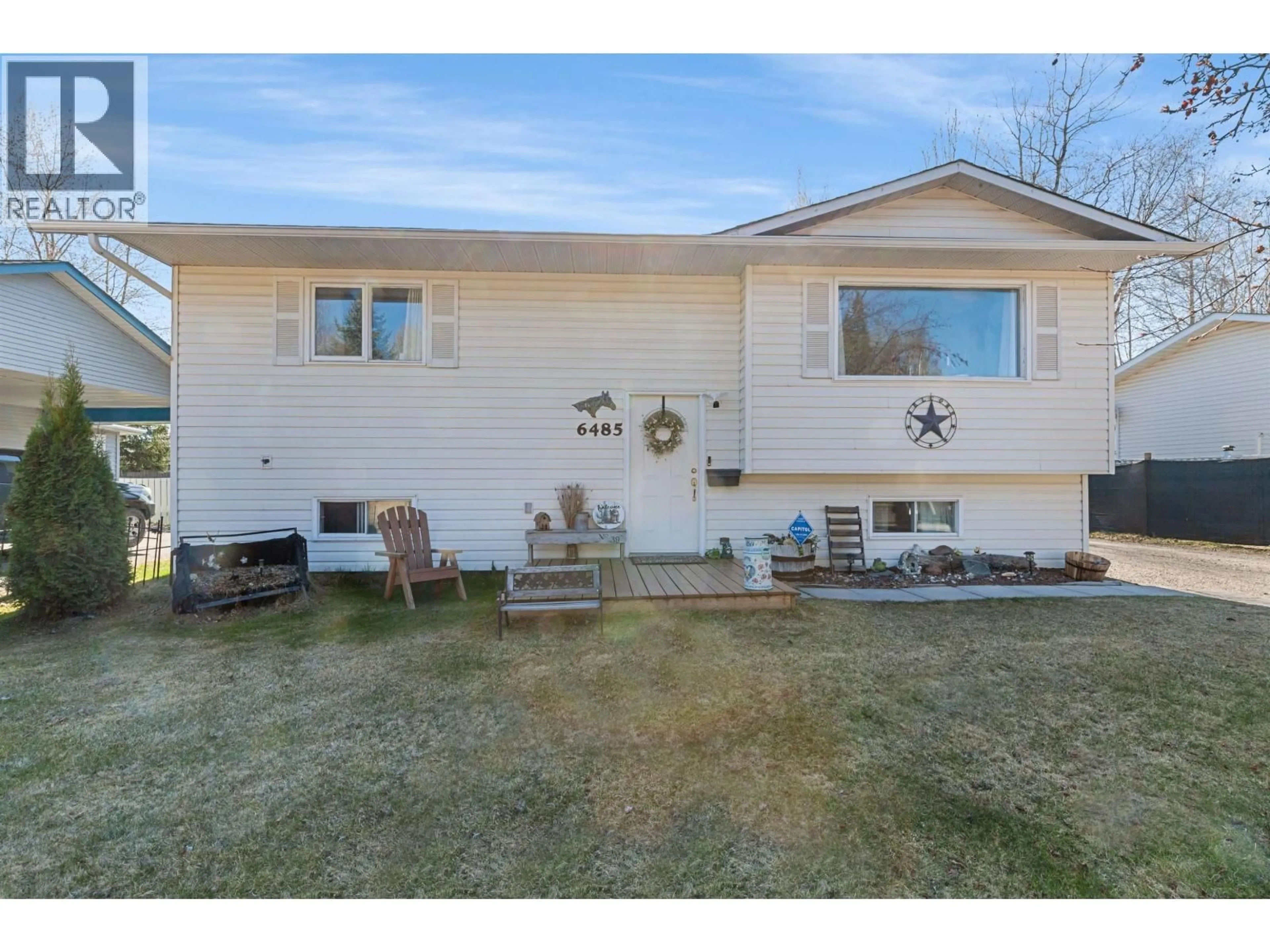 Home with vinyl exterior material, street for 6485 DRIFTWOOD ROAD, Prince George British Columbia V2K4E3