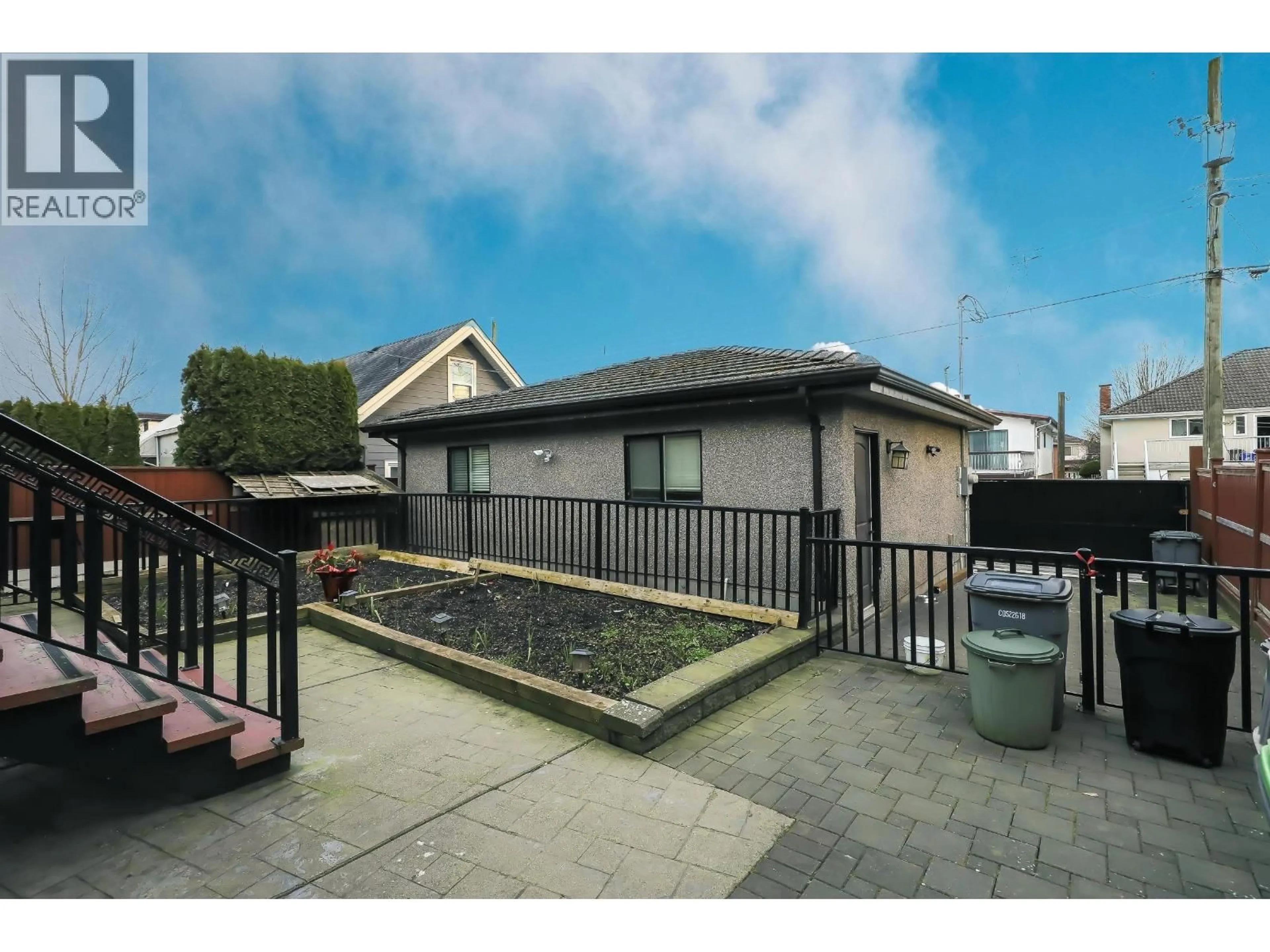 A pic from outside/outdoor area/front of a property/back of a property/a pic from drone, street for 66 44TH AVENUE, Vancouver British Columbia V5Y2V1