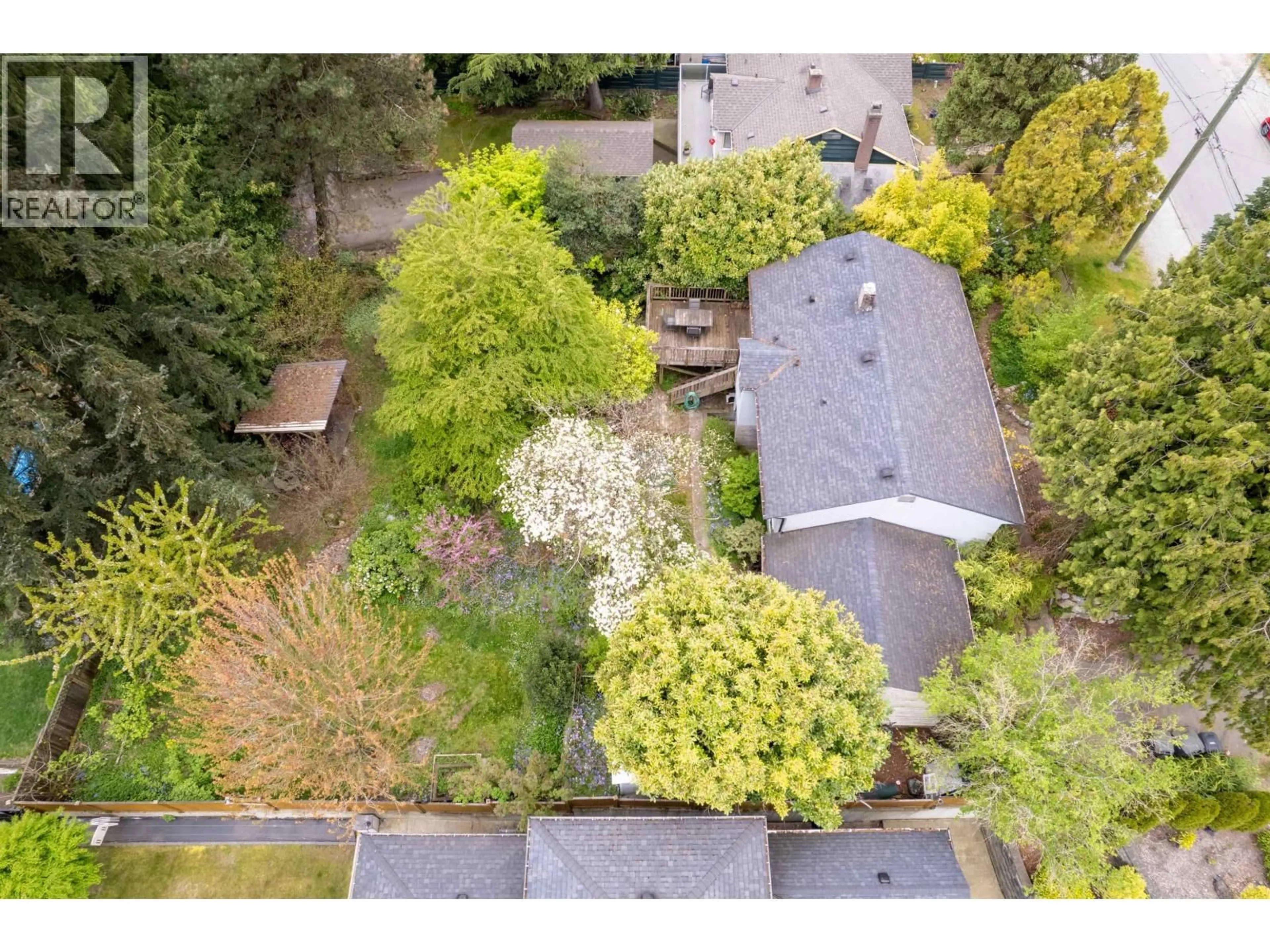 A pic from outside/outdoor area/front of a property/back of a property/a pic from drone, forest/trees view for 6138 PORTLAND STREET, Burnaby British Columbia V5J2S2