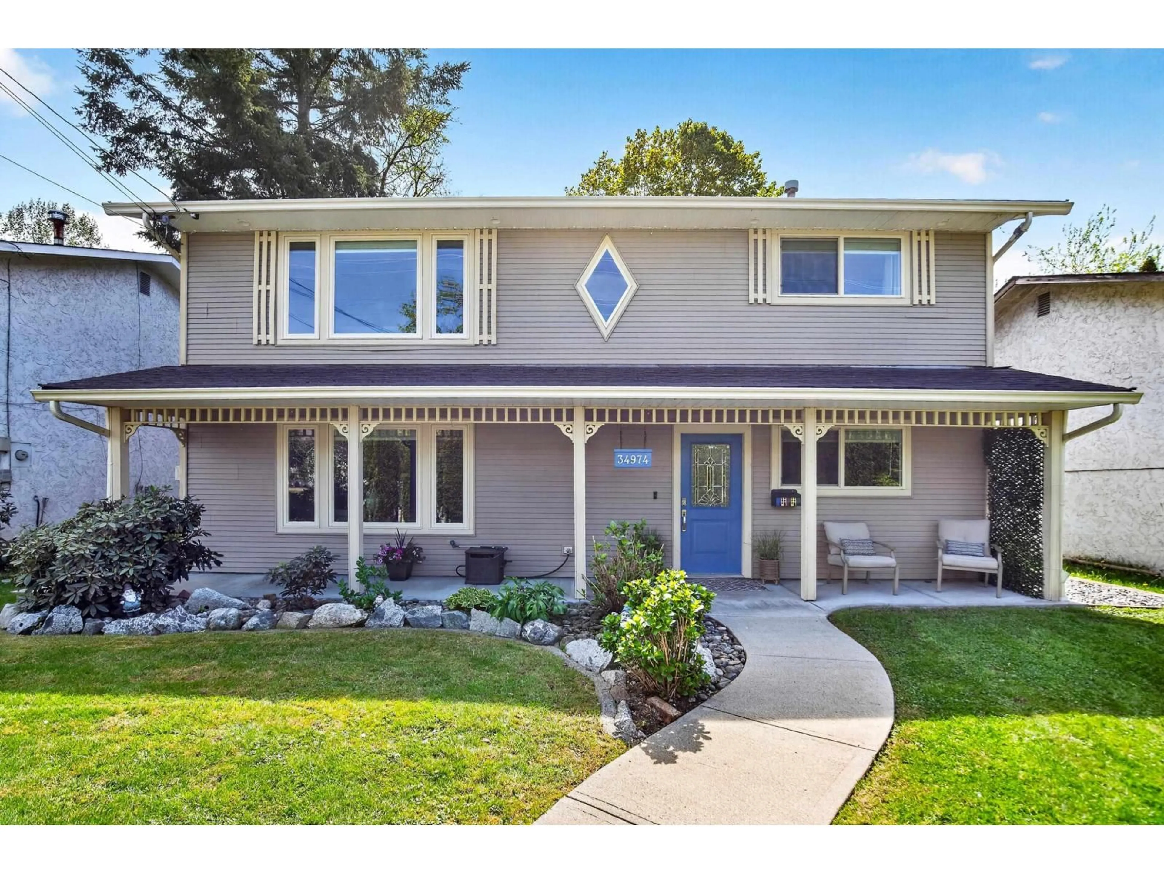 Home with vinyl exterior material, street for 34974 CLAYBURN ROAD, Abbotsford British Columbia V2S7Y9