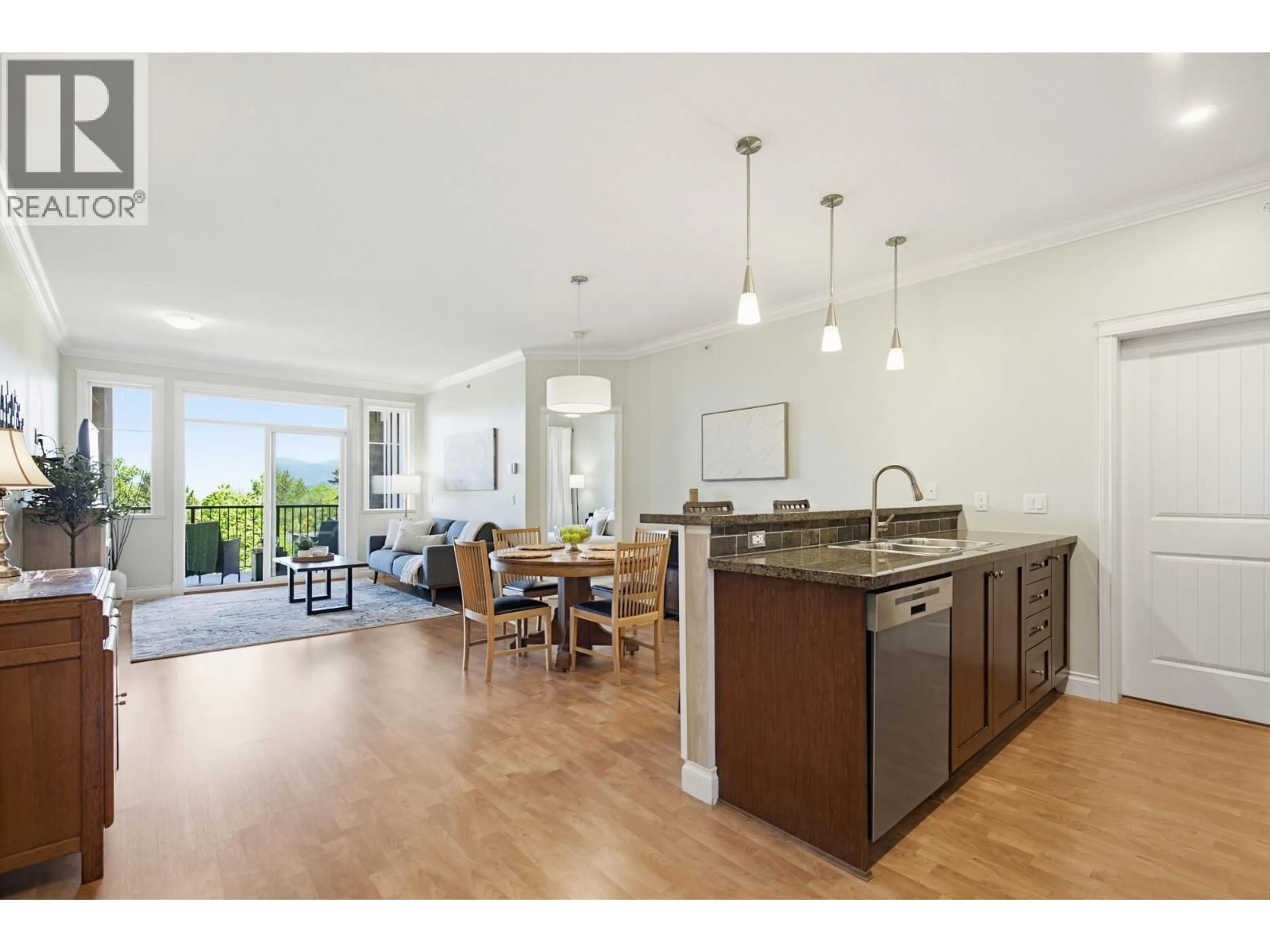 Open concept kitchen, wood/laminate floor for 427 - 12258 224 STREET, Maple Ridge British Columbia V2X8Y7