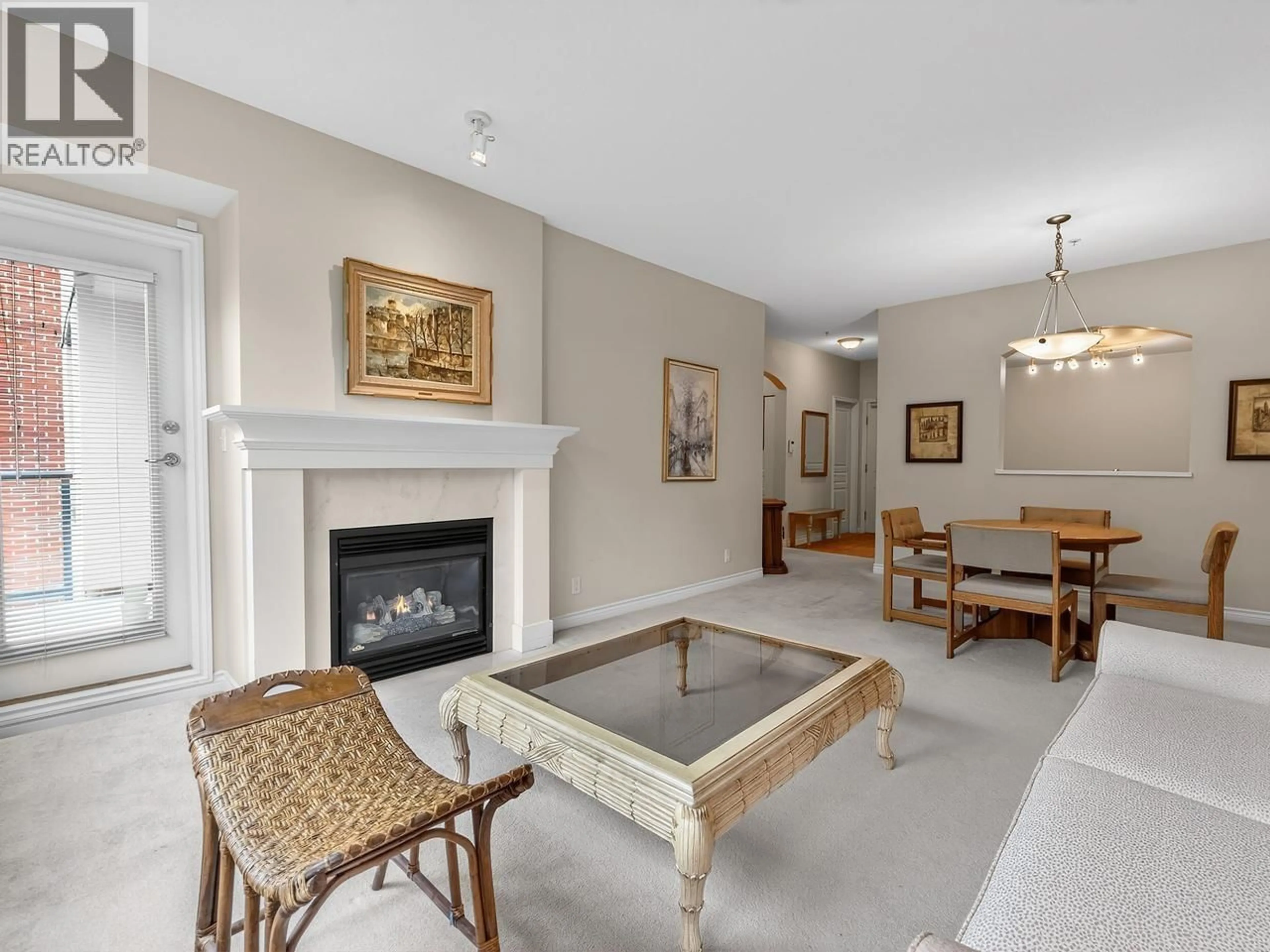 Living room with furniture, ceramic/tile floor for 205 - 588 45TH AVENUE, Vancouver British Columbia V5Z4S3