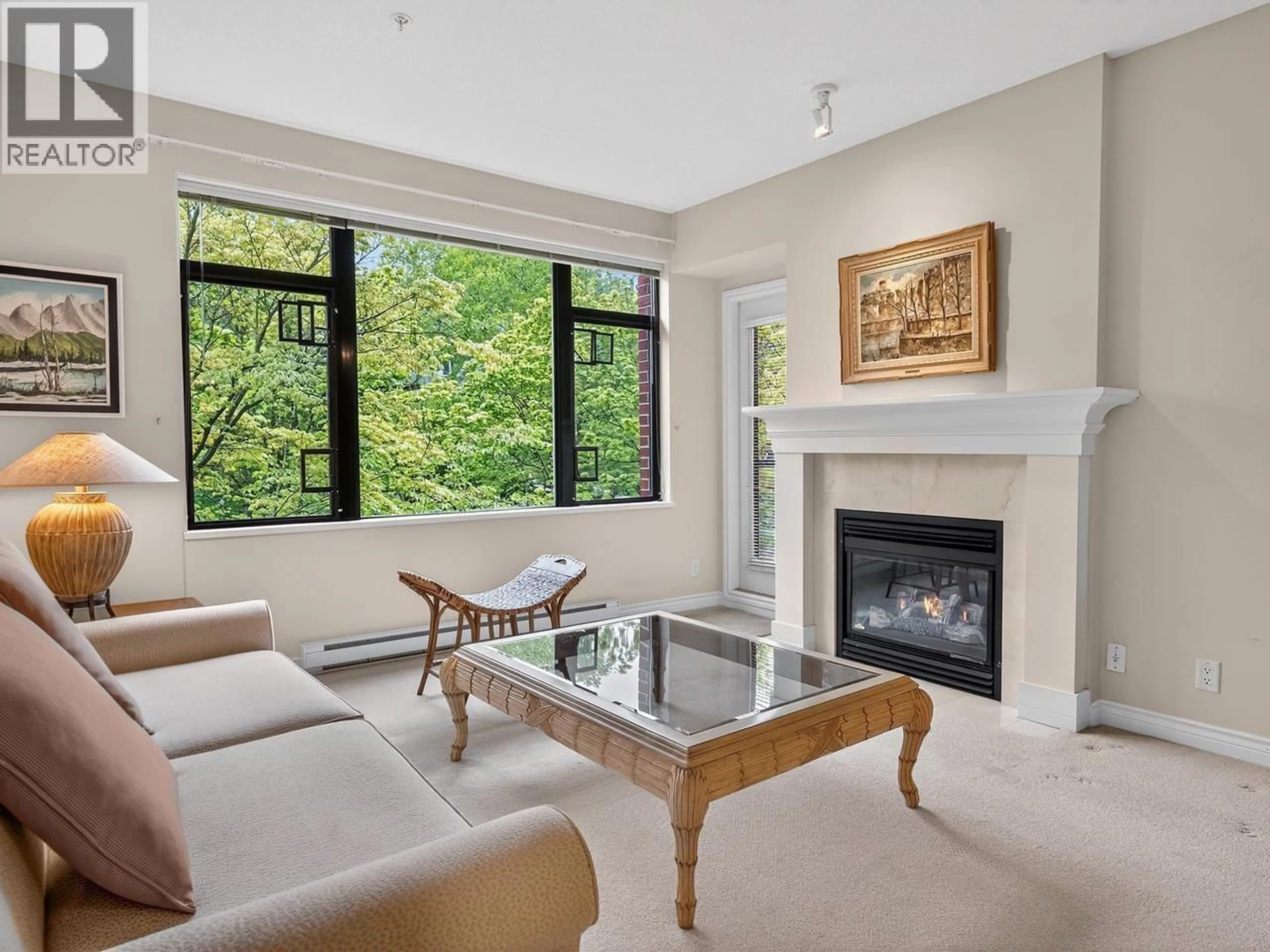 Living room with furniture, unknown for 205 - 588 45TH AVENUE, Vancouver British Columbia V5Z4S3