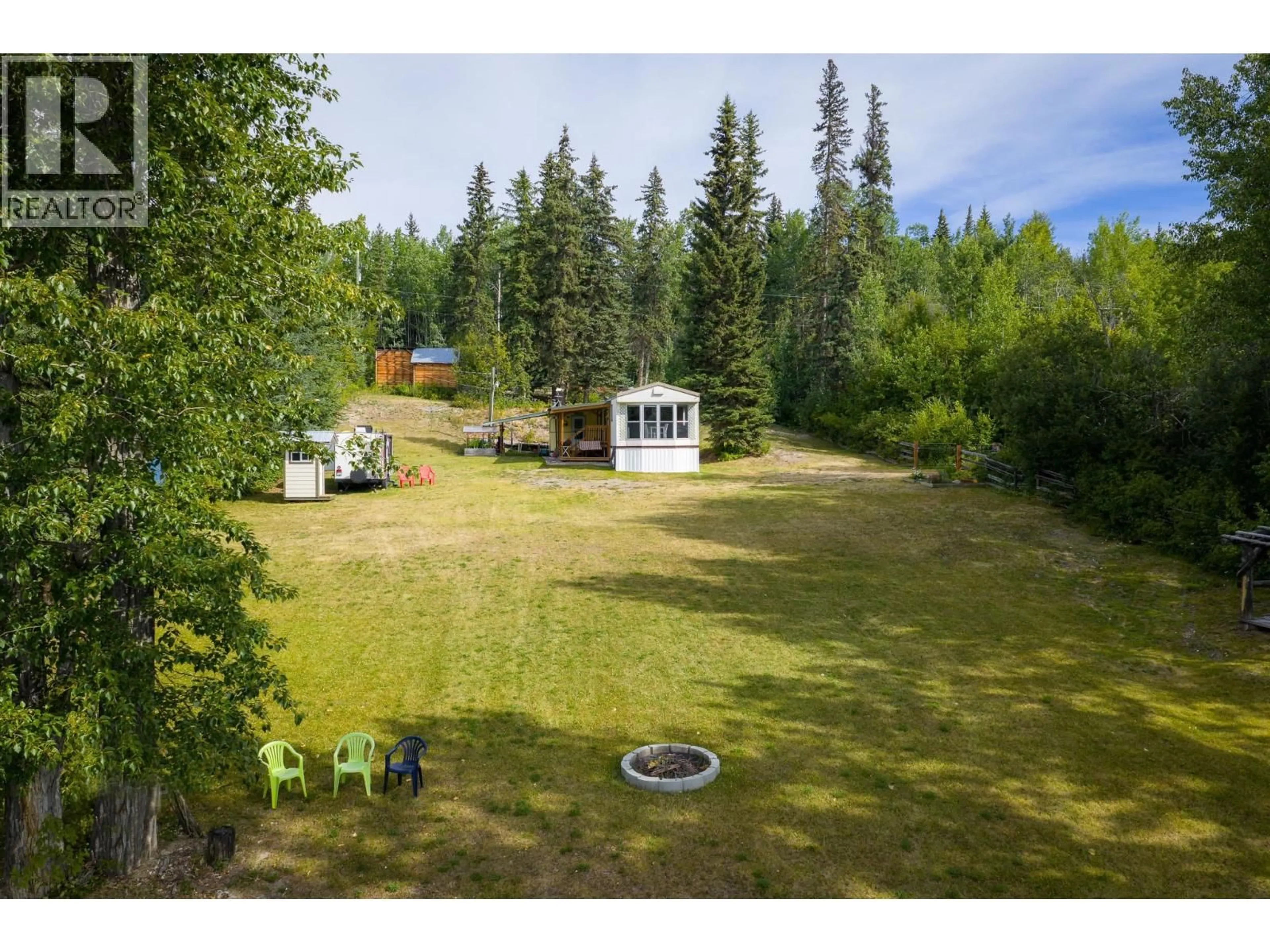 A pic from outside/outdoor area/front of a property/back of a property/a pic from drone, forest/trees view for 5965 MCKENZIE ROAD, Fraser Lake British Columbia V0J1S0
