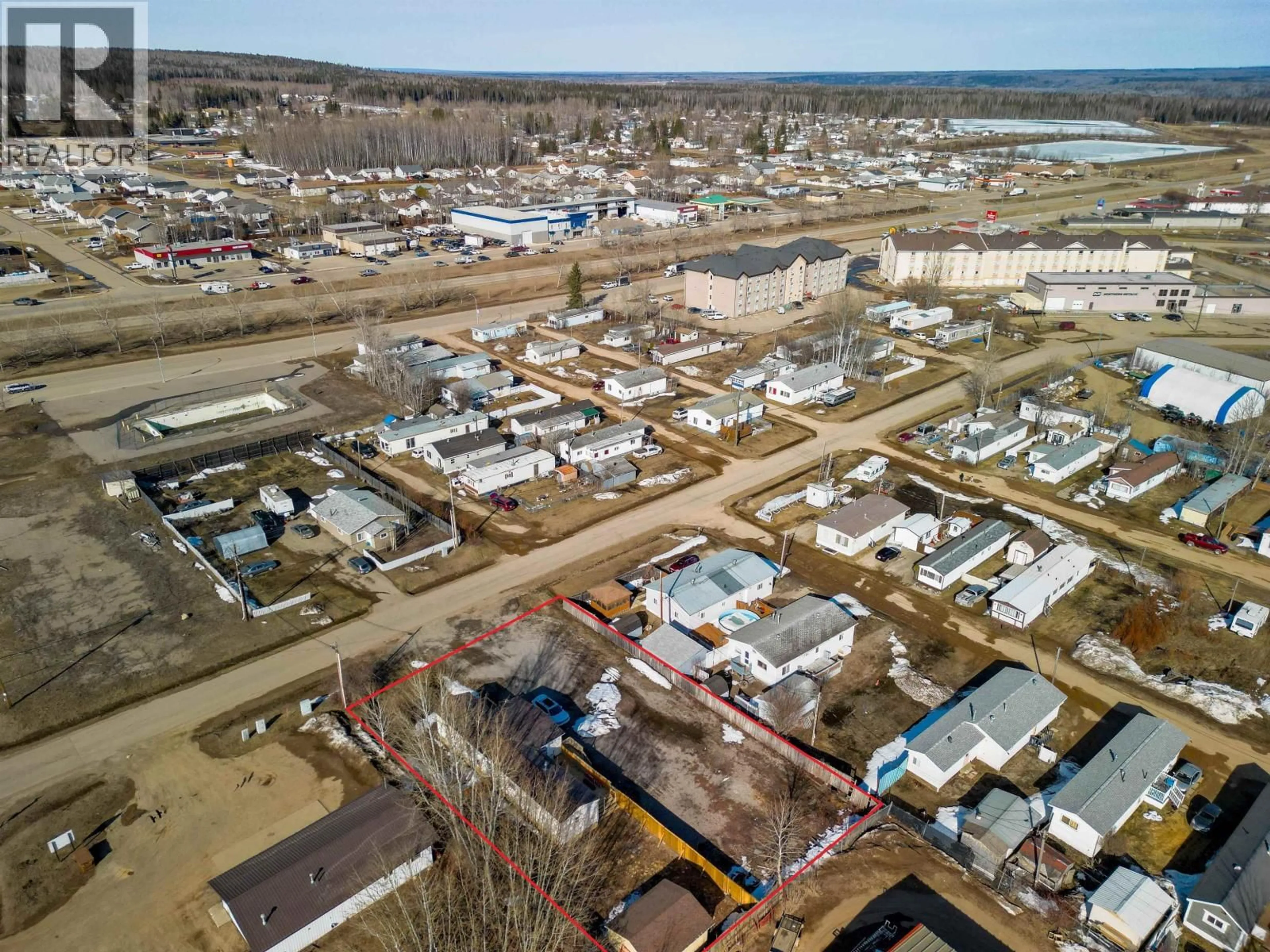A pic from outside/outdoor area/front of a property/back of a property/a pic from drone, street for 4707 49 AVENUE, Fort Nelson British Columbia V0C1R0