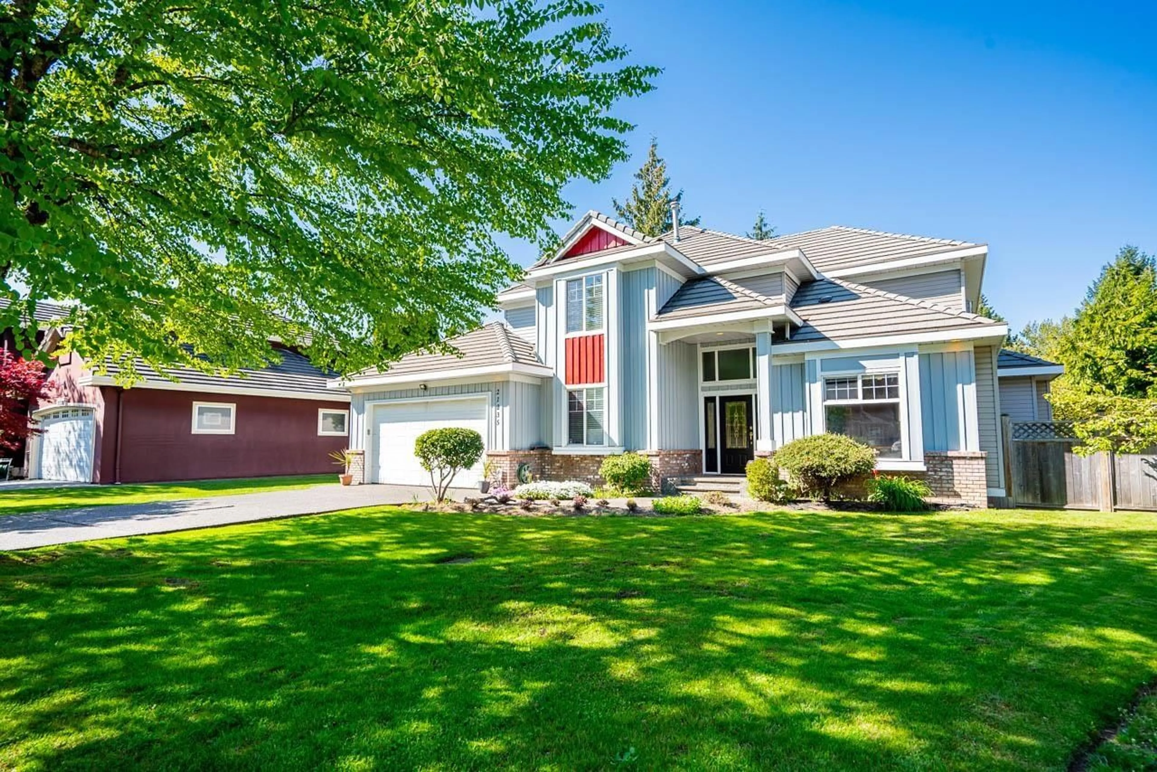 Home with vinyl exterior material, street for 21235 43A AVENUE, Langley British Columbia V3A8S4
