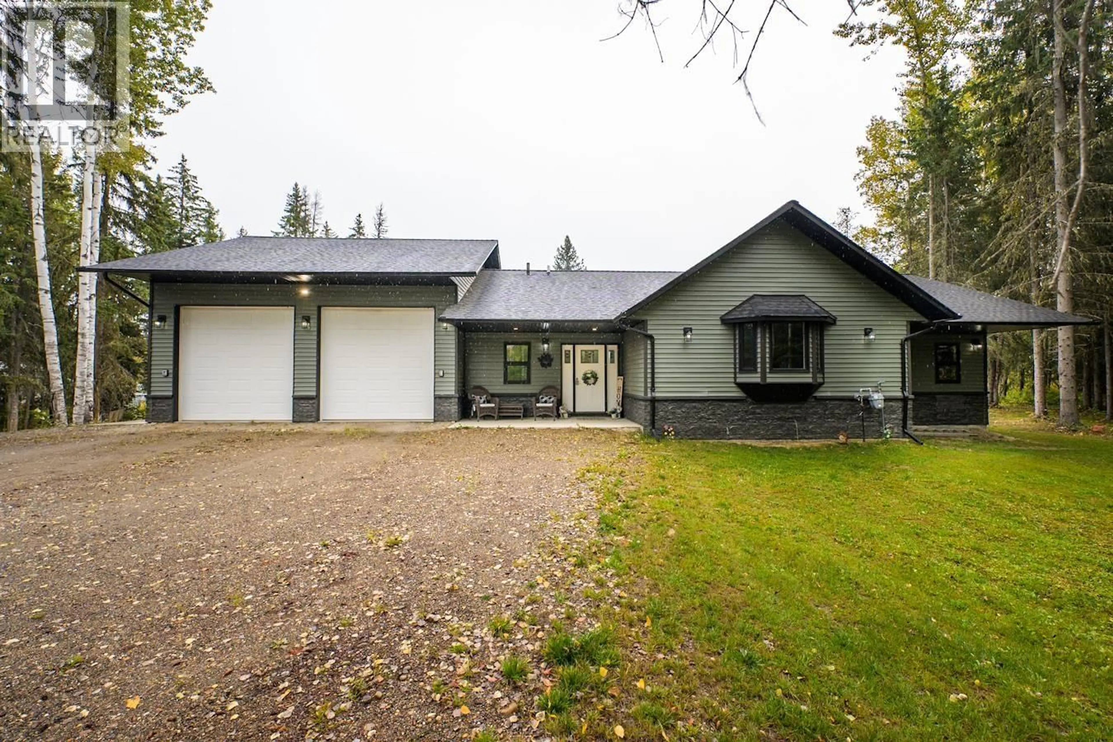 A pic from outside/outdoor area/front of a property/back of a property/a pic from drone, street for 4438 HANET ROAD, Prince George British Columbia V2K5S1