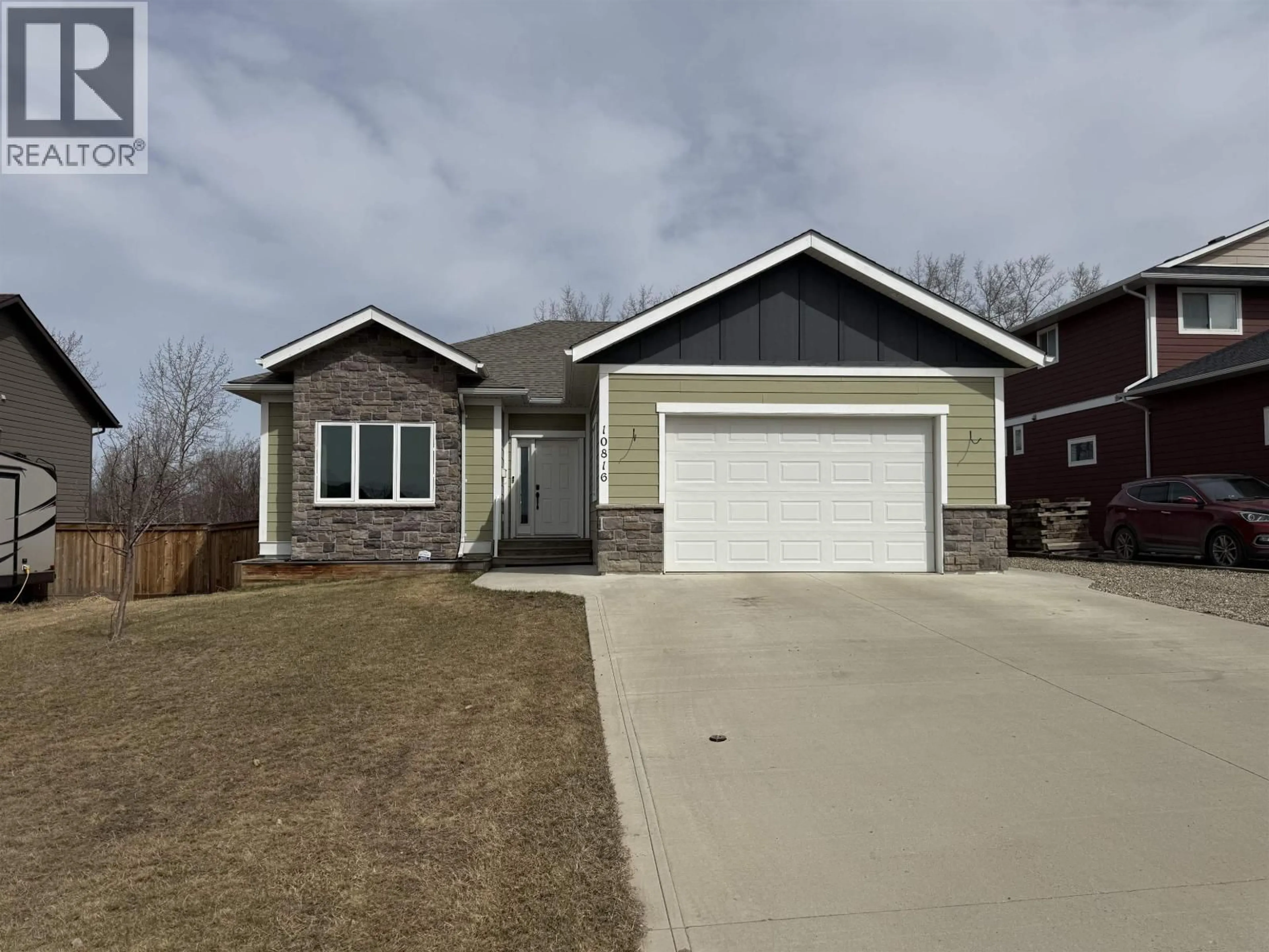 Home with vinyl exterior material, street for 10816 108 AVENUE, Fort St. John British Columbia V1J0J3