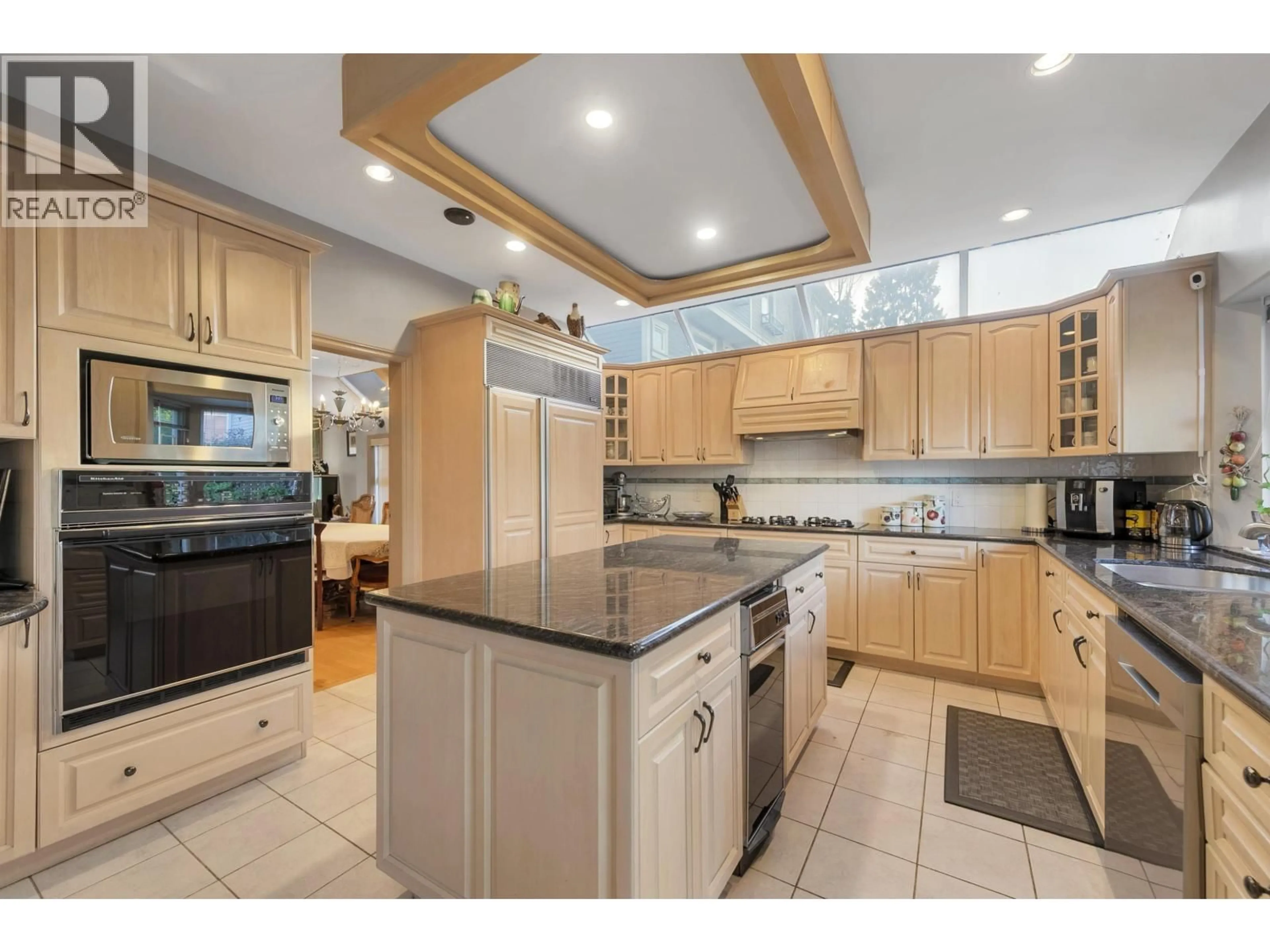Open concept kitchen, ceramic/tile floor for 9731 ALBERTA ROAD, Richmond British Columbia V6Y1T7