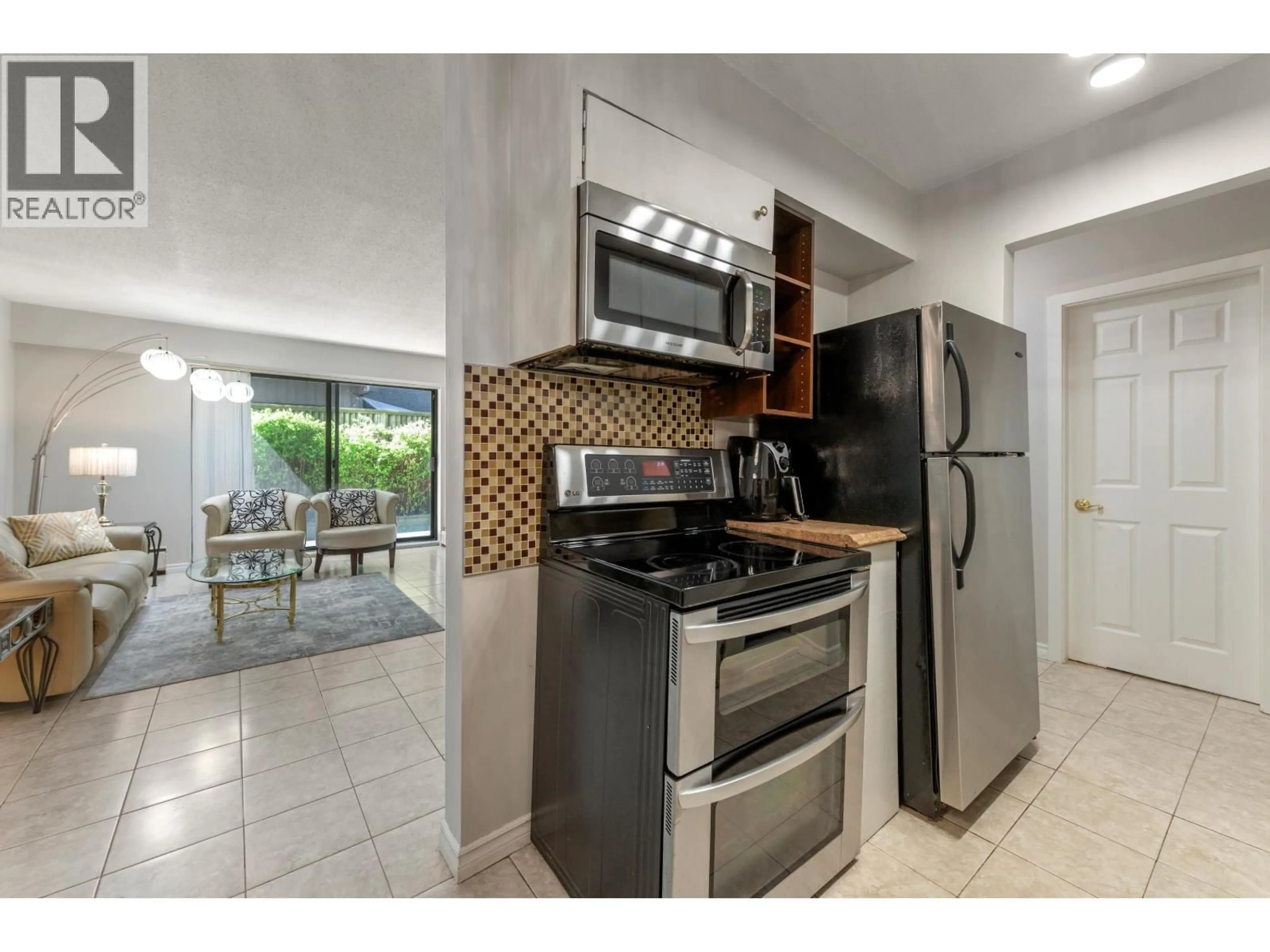 Standard kitchen, ceramic/tile floor for 103 - 2040 CORNWALL AVENUE, Vancouver British Columbia V6J1E1