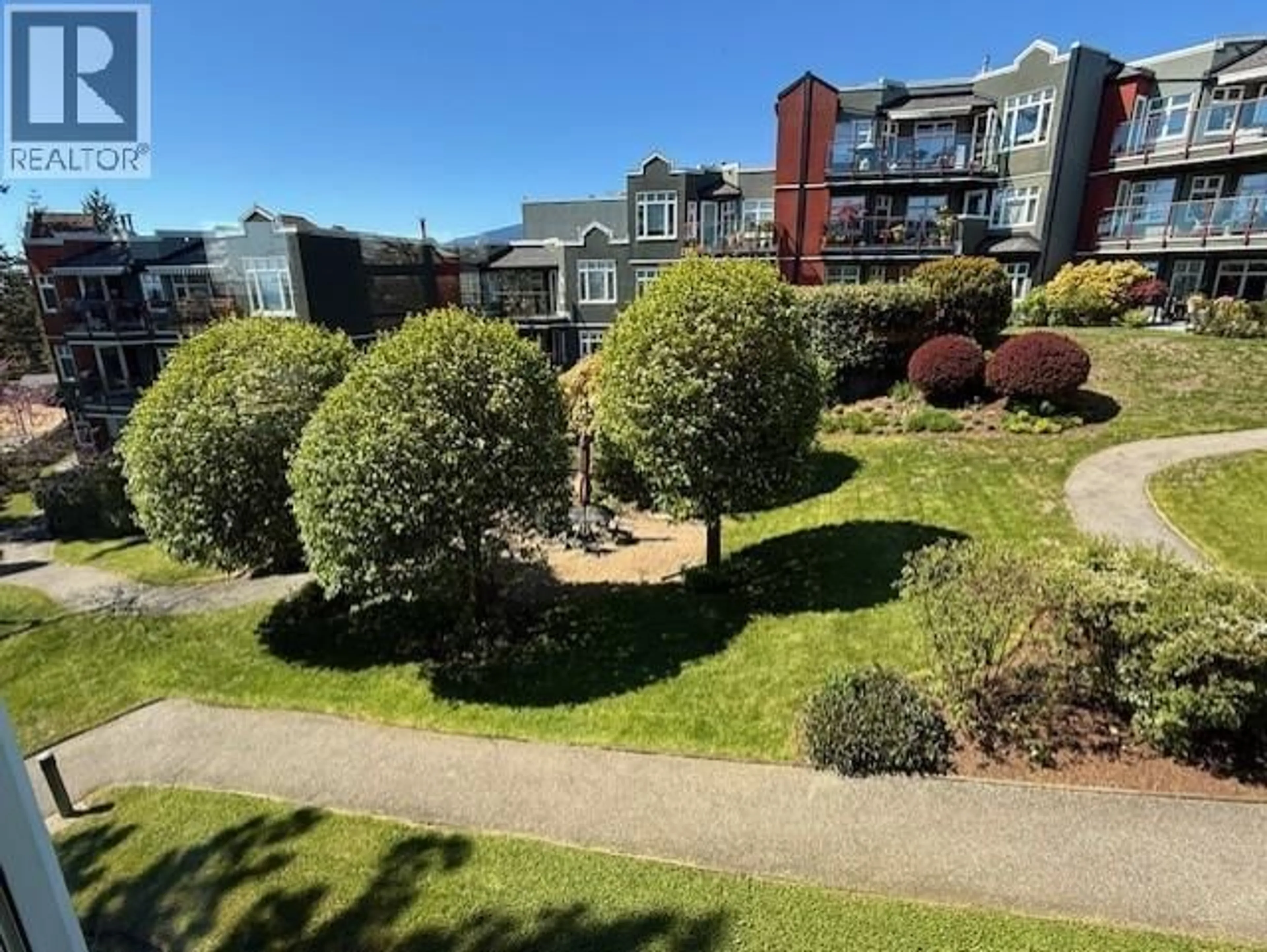 A pic from outside/outdoor area/front of a property/back of a property/a pic from drone, unknown for 322 - 121 29 STREET, North Vancouver British Columbia V7N4L6