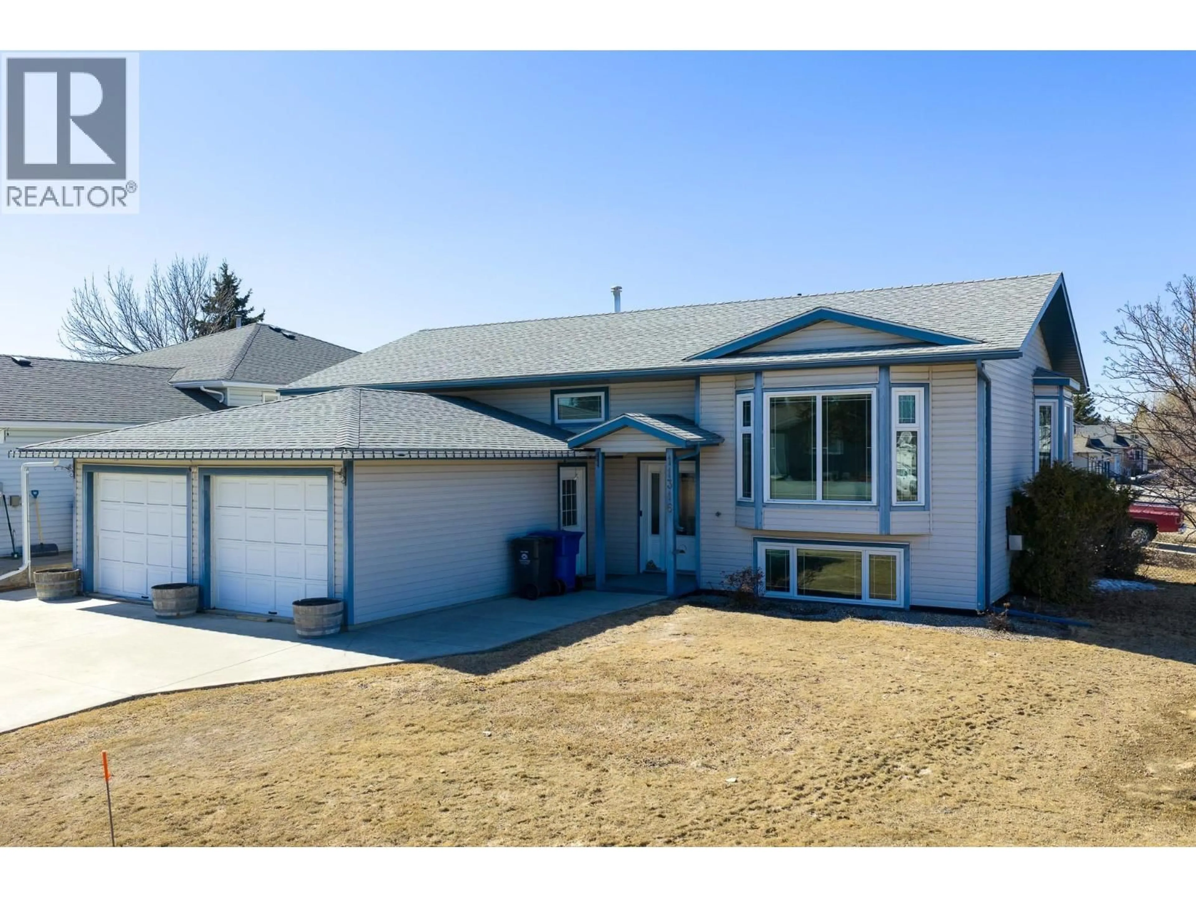 Home with vinyl exterior material, street for 11316 106 STREET, Fort St. John British Columbia V1J6H6