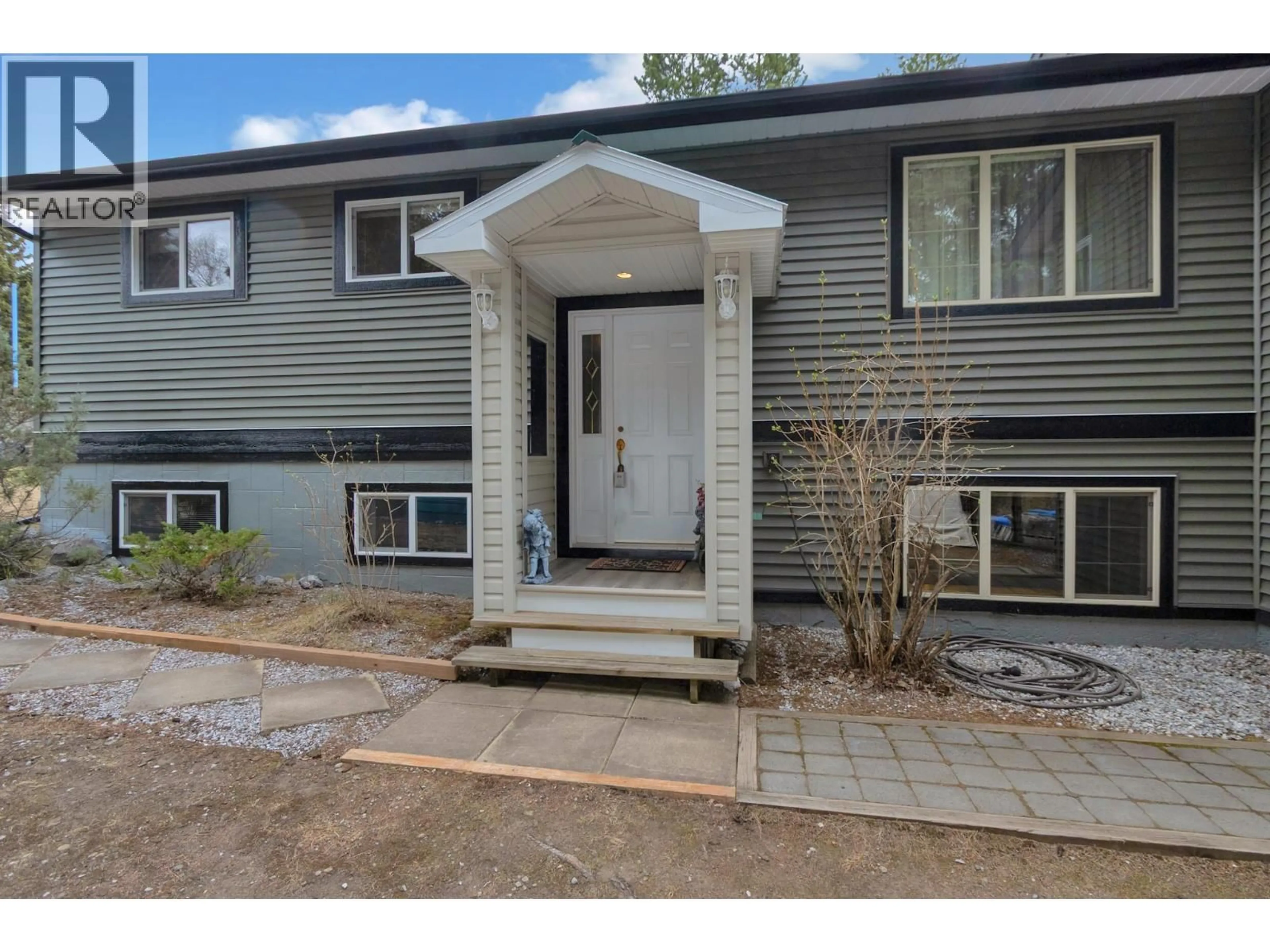 Home with vinyl exterior material, street for 3466 SUTHERLAND ROAD, Prince George British Columbia V2K1B8