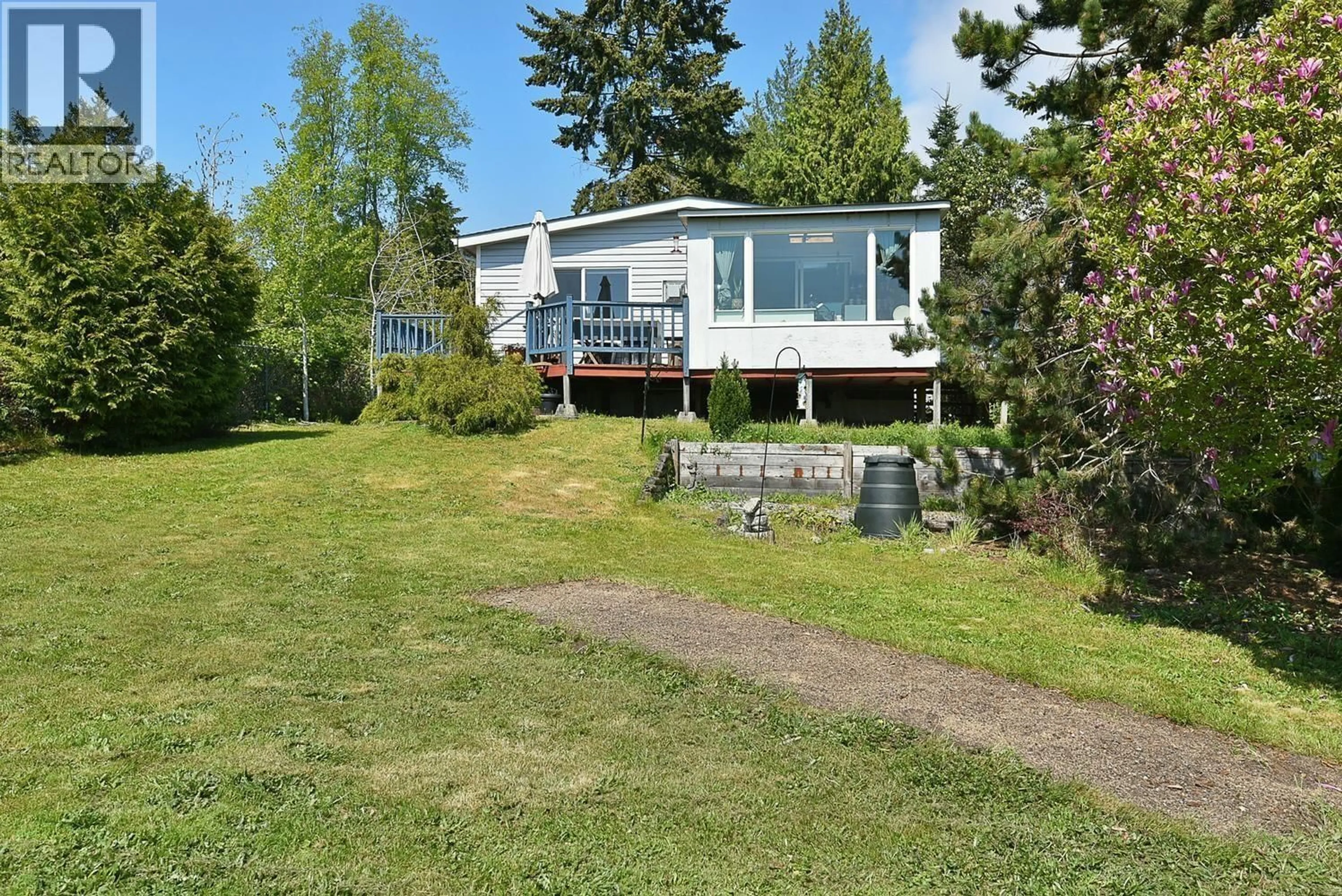 A pic from outside/outdoor area/front of a property/back of a property/a pic from drone, water/lake/river/ocean view for 6217 BLIGH ROAD, Sechelt British Columbia V7Z0M1