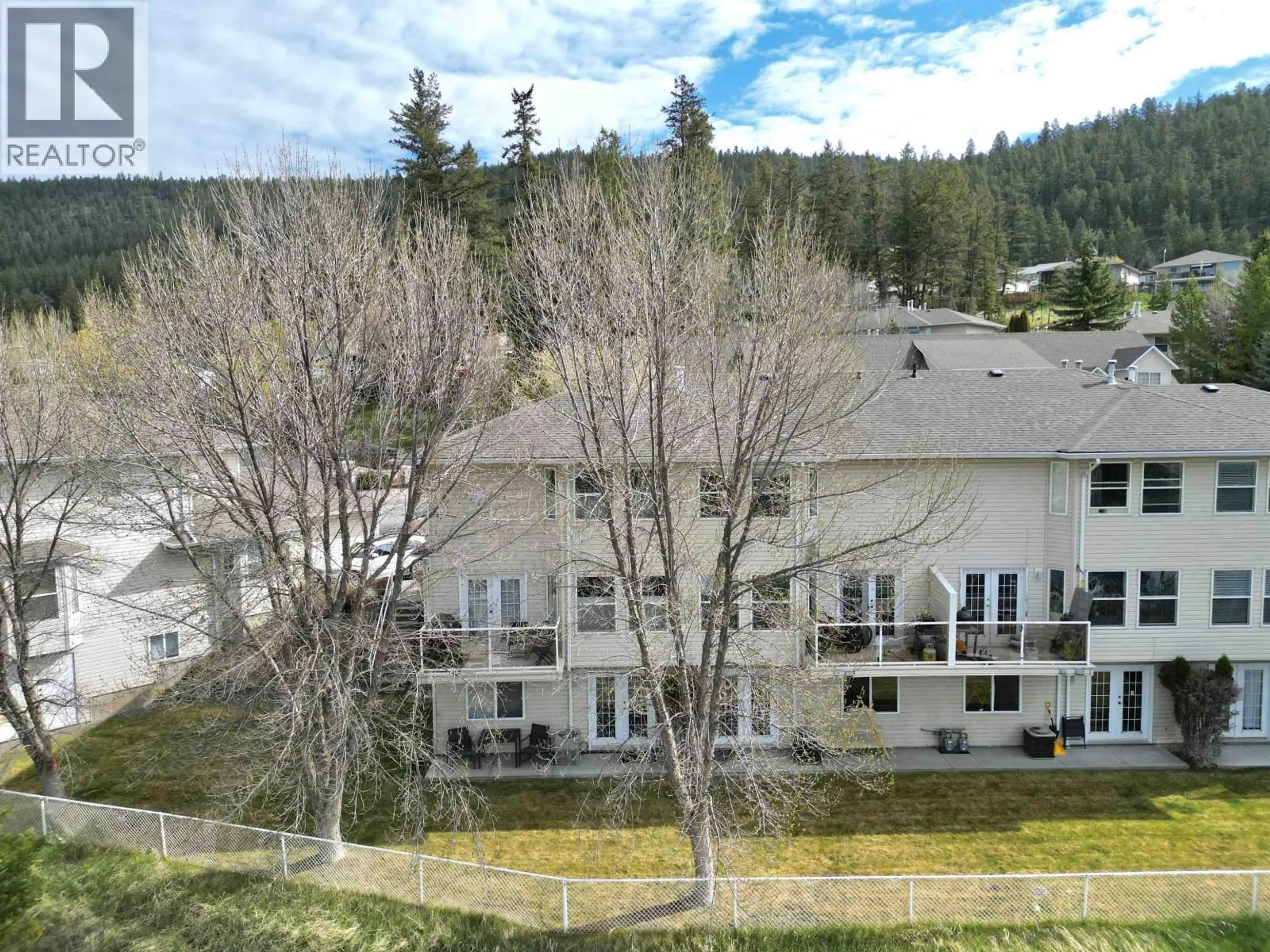 A pic from outside/outdoor area/front of a property/back of a property/a pic from drone, mountain view for 5 - 350 PEARKES DRIVE, Williams Lake British Columbia V2G4T2