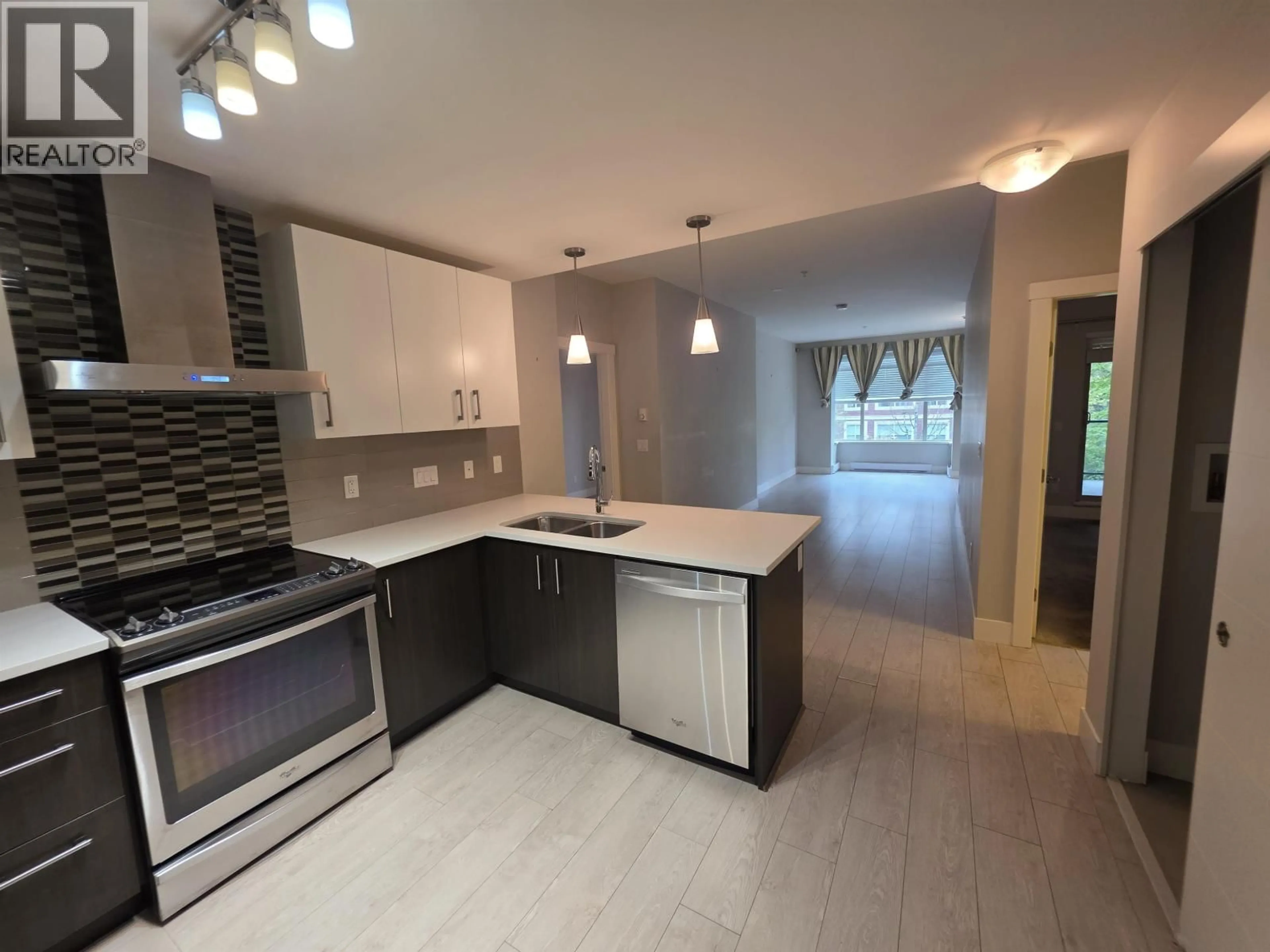 Open concept kitchen, ceramic/tile floor for 204 - 2460 KELLY AVENUE, Port Coquitlam British Columbia V3C1Y3