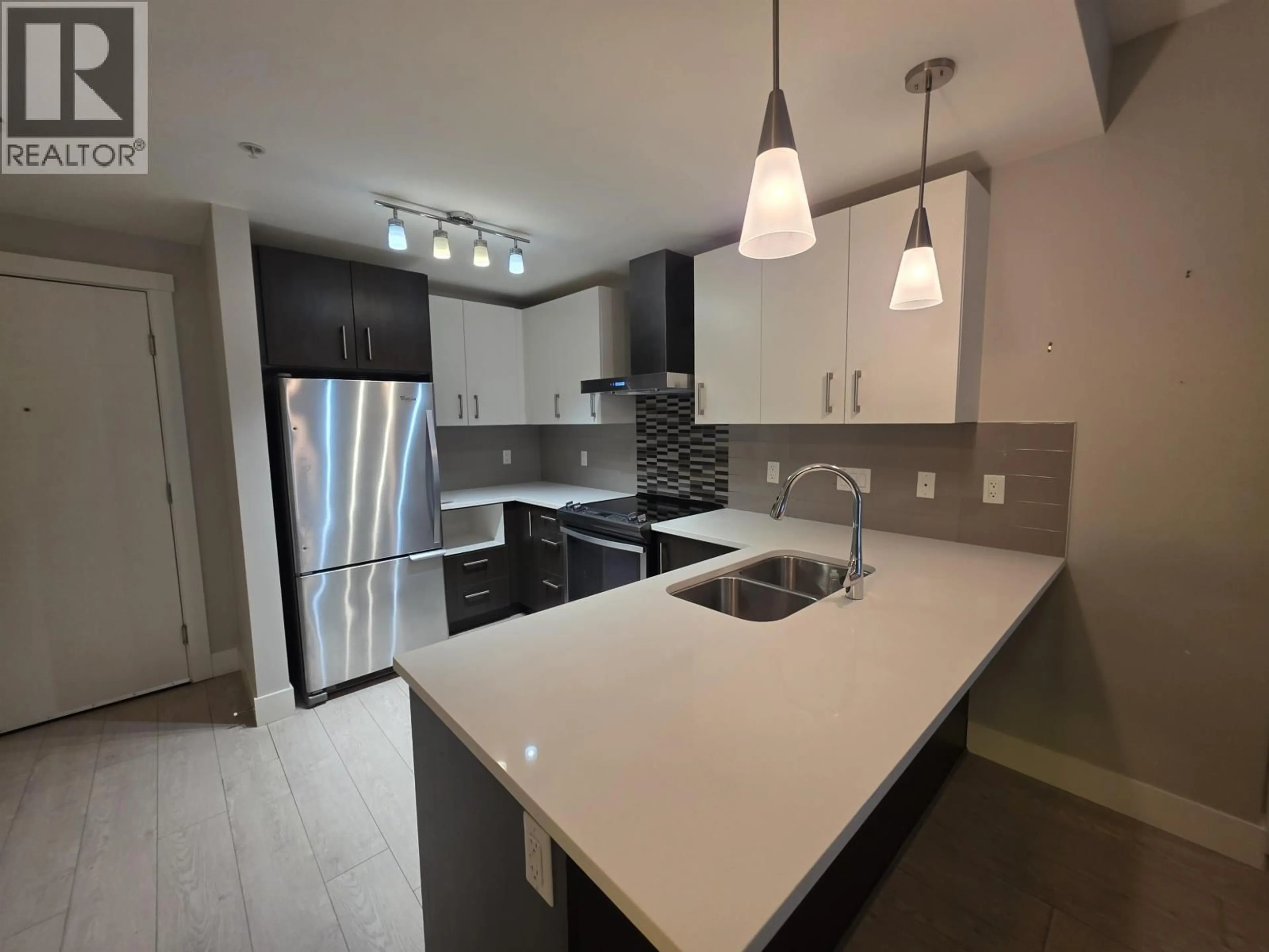 Open concept kitchen, unknown for 204 - 2460 KELLY AVENUE, Port Coquitlam British Columbia V3C1Y3