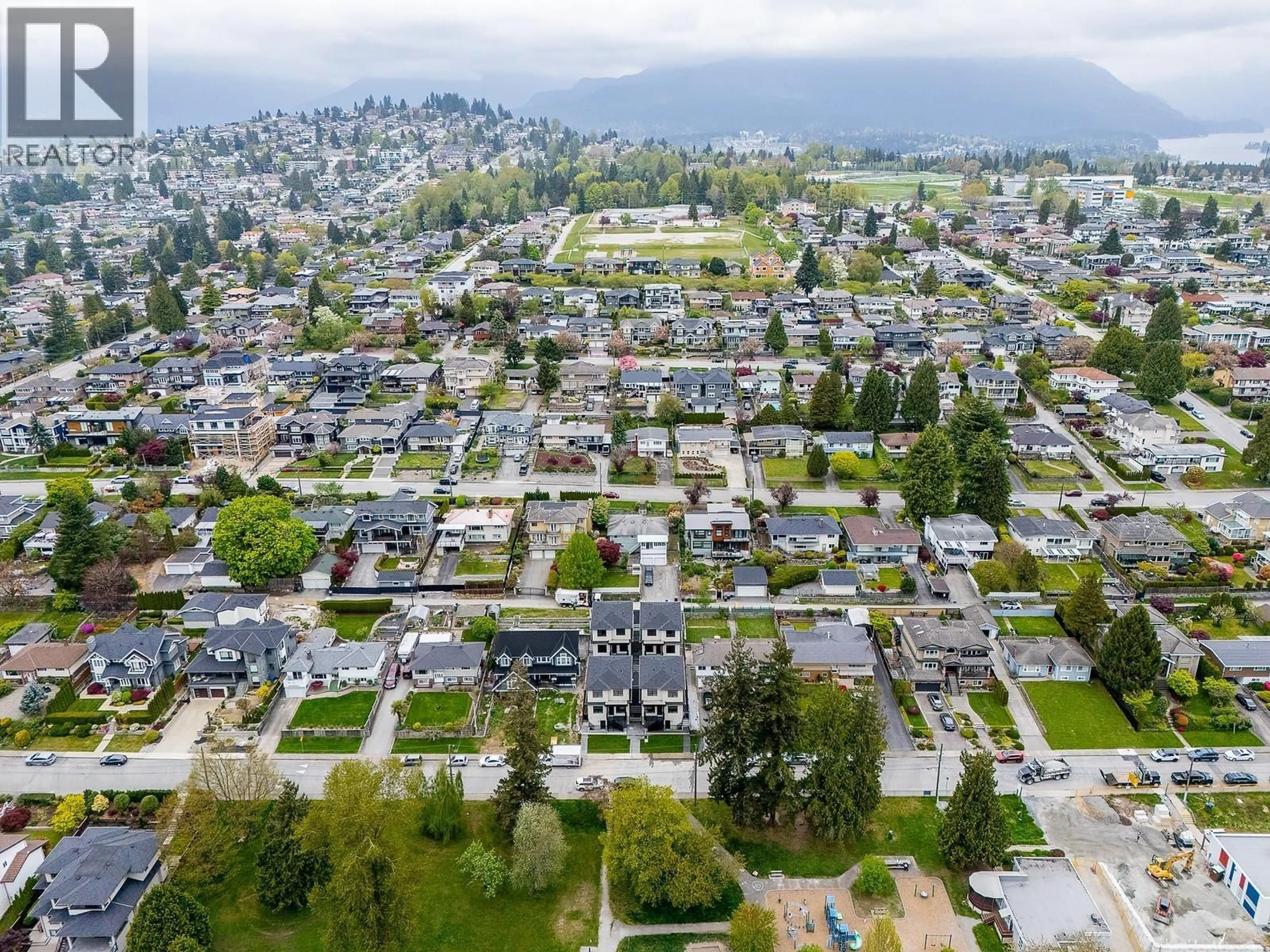 A pic from outside/outdoor area/front of a property/back of a property/a pic from drone, mountain view for 3 - 5953 WINCH STREET, Burnaby British Columbia V5B2L1
