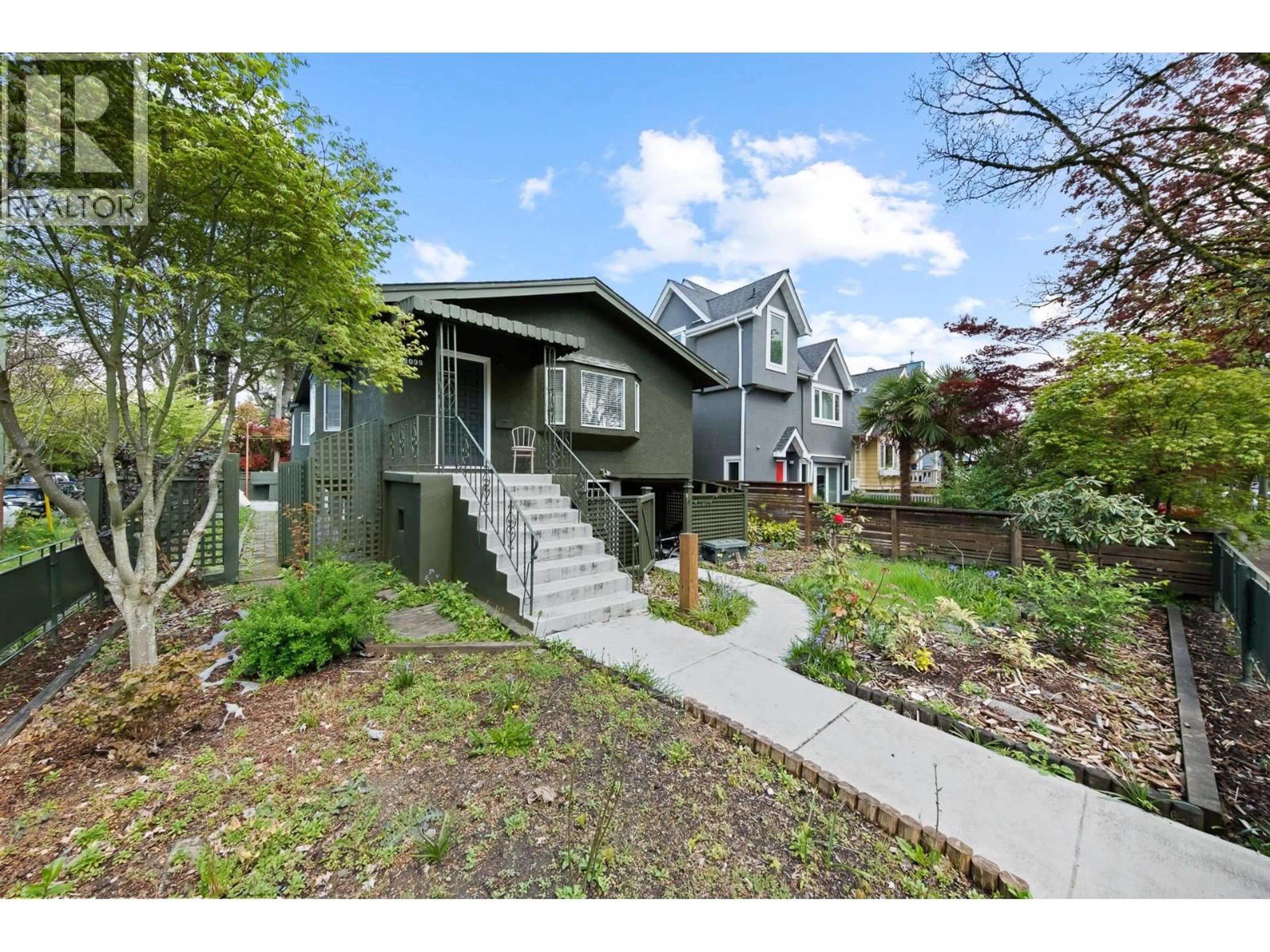 Home with vinyl exterior material, street for 3099 6TH AVENUE, Vancouver British Columbia V6K1X4