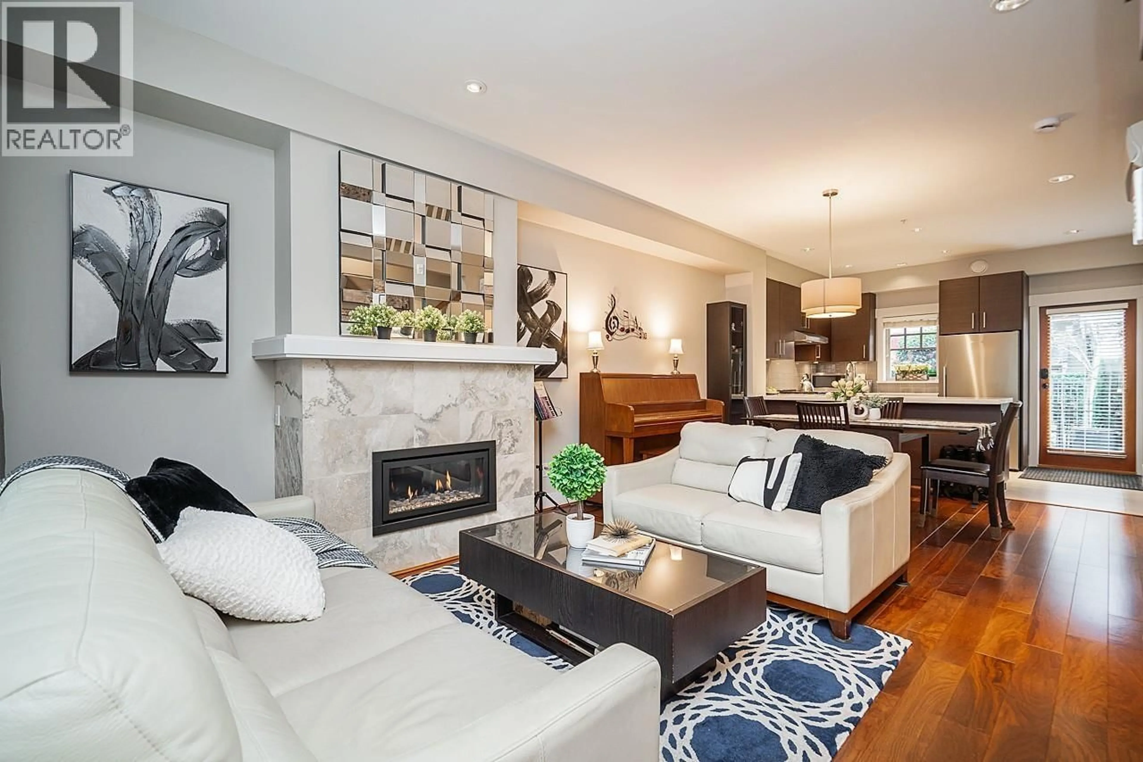 Living room with furniture, ceramic/tile floor for 5946 OAK STREET, Vancouver British Columbia V6M2W2